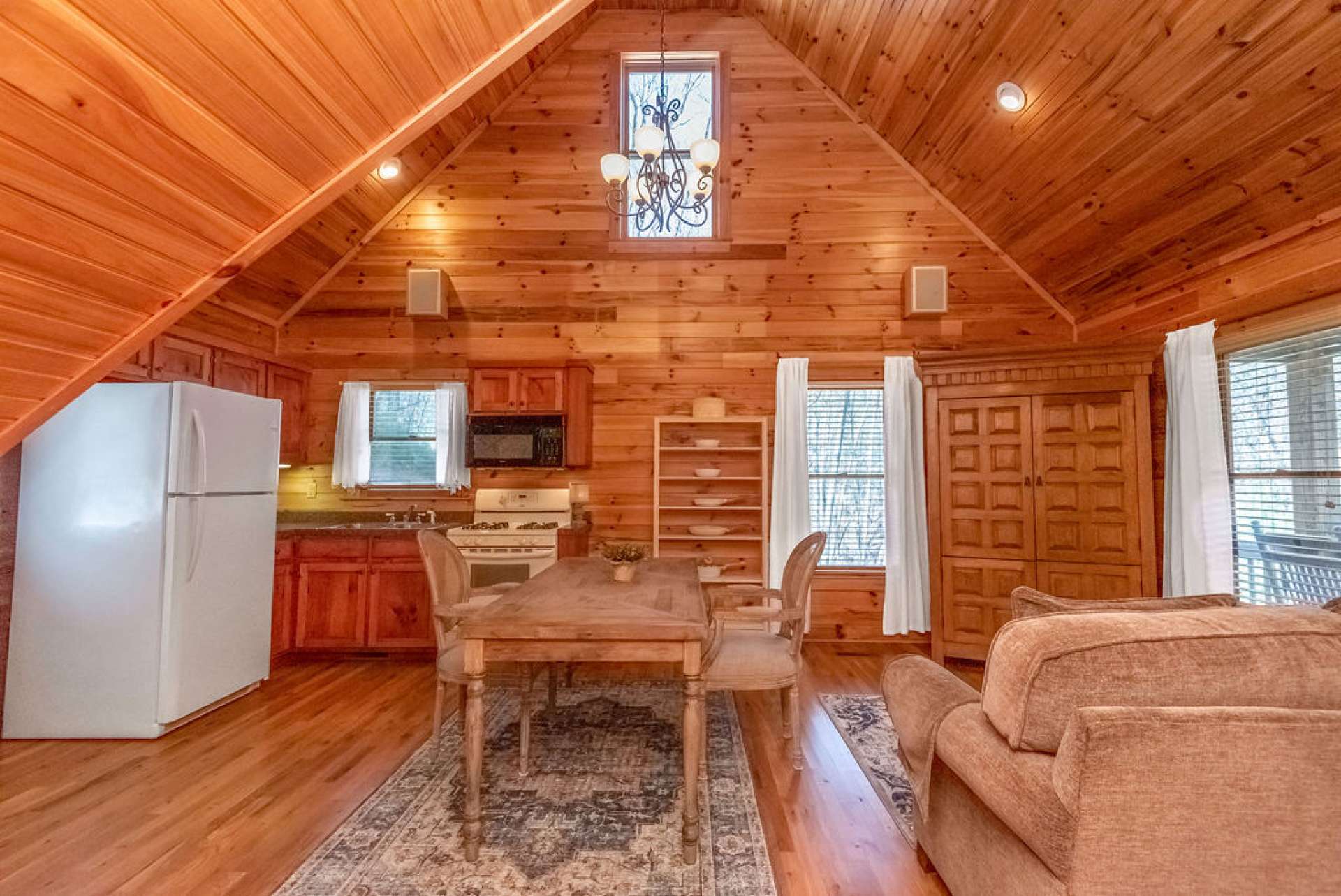 Looking towards the front door; you can also see the entrance to the bedroom.