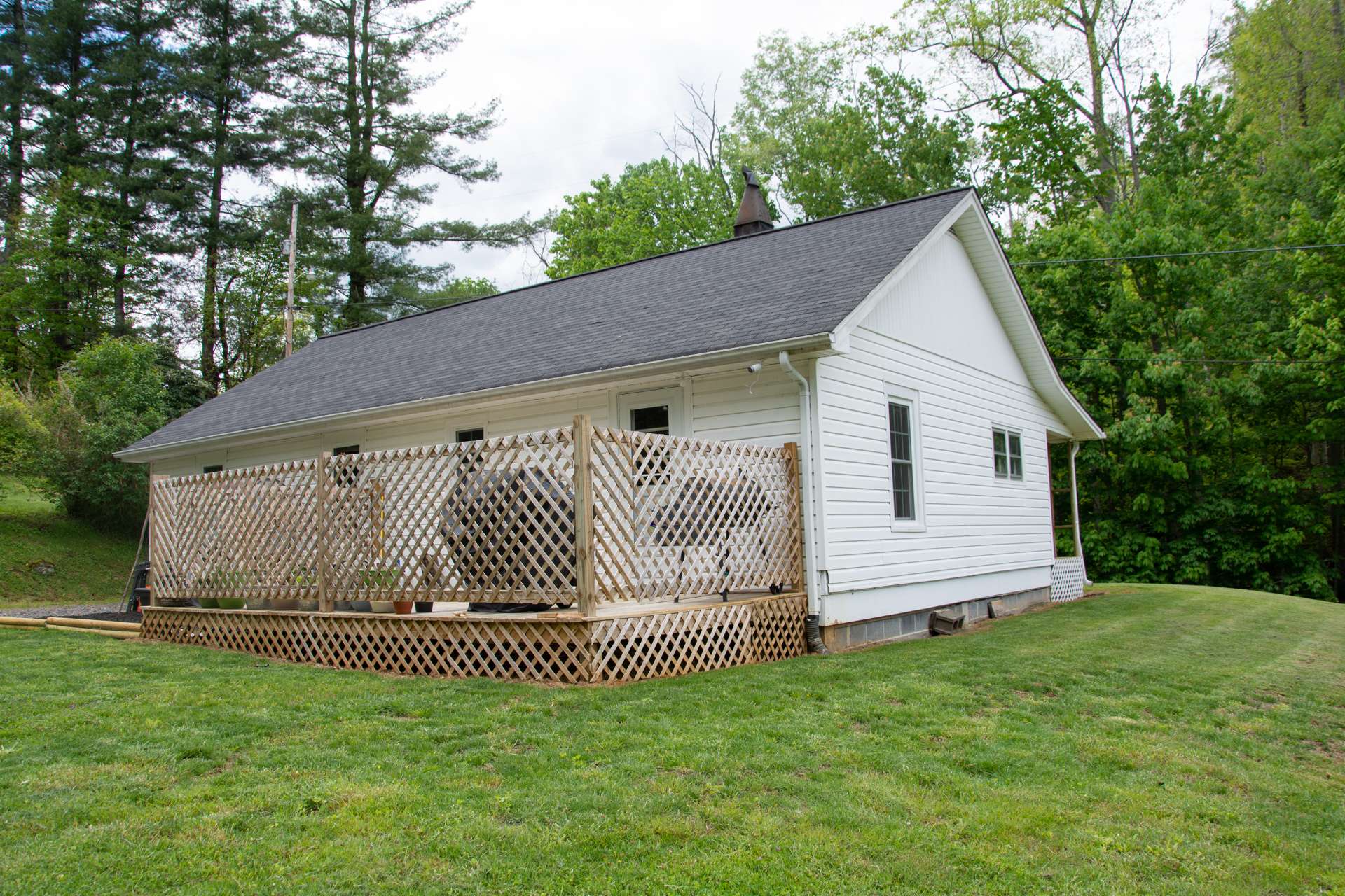 Or, relax on the back deck and enjoy the private back yard.