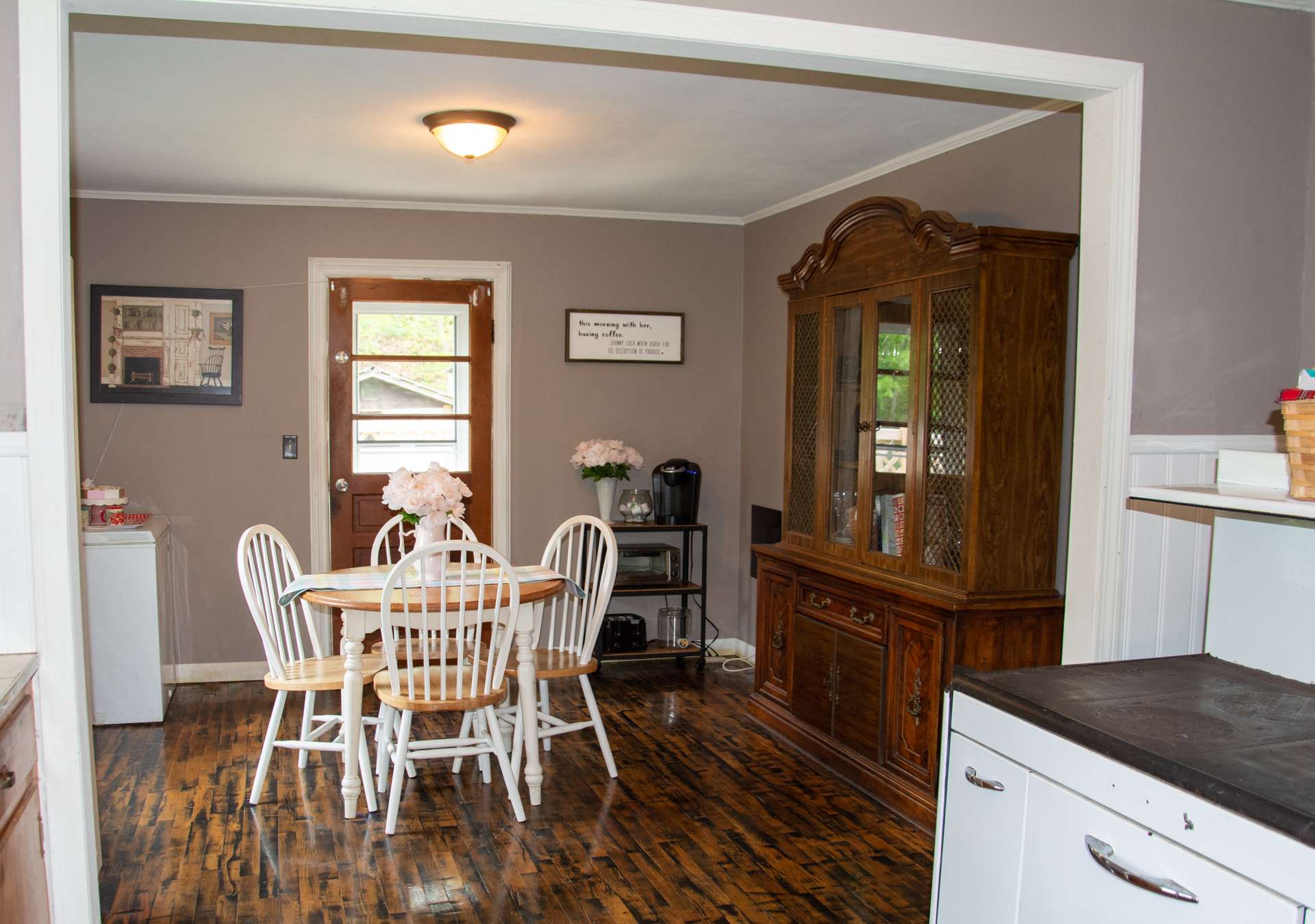 The dining area is open to the kitchen and also offers easy access to the outdoors.