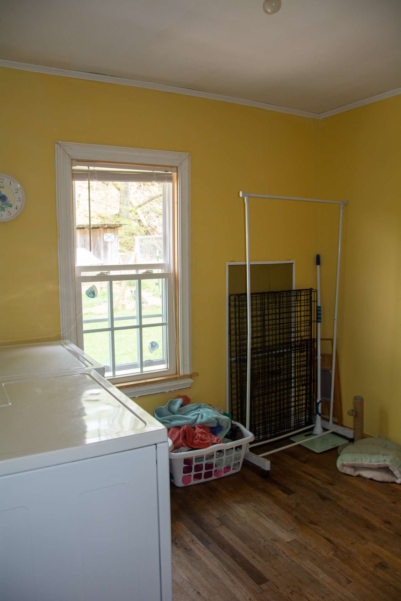 The third bedroom is currently utilized as laundry room but could be converted back to bedroom if desired.
