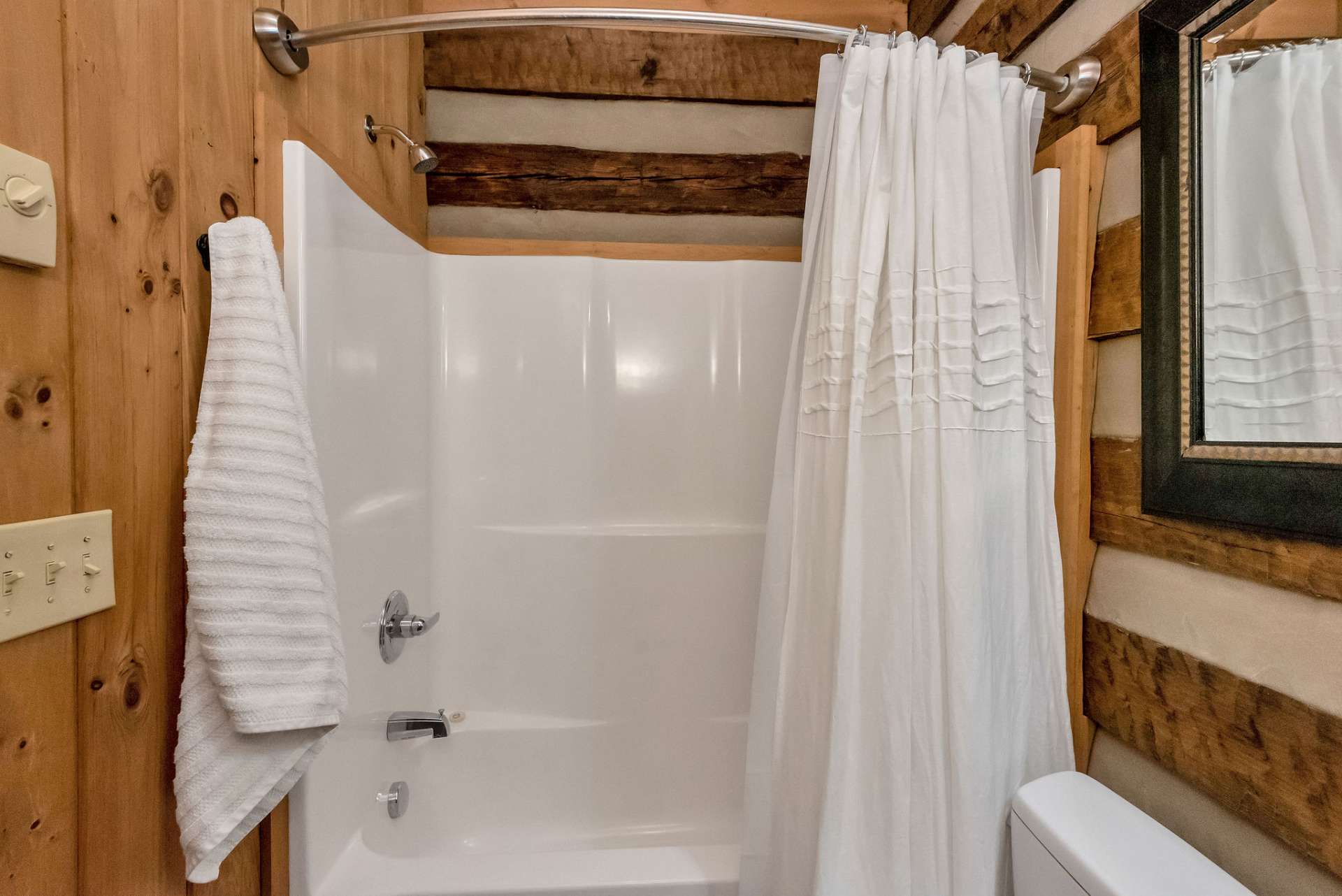 This loft full bath is complete with a tub-shower combo.