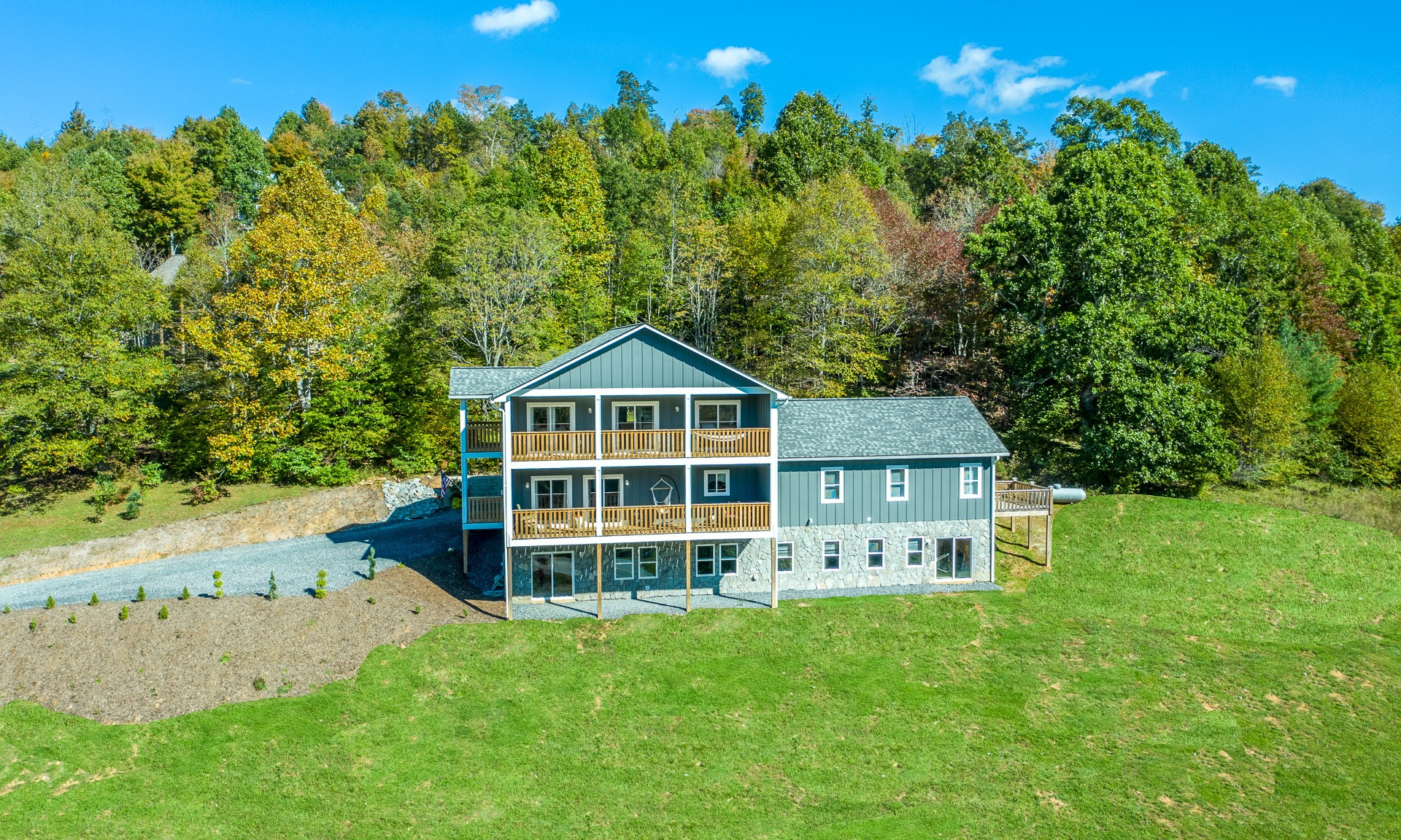 LIKE-NEW, QUALITY CRAFTSMANSHIP, VIEW & GREAT SOUTHERN ASHE COUNTY LOCATION! This family-size home in Todd is only a year old and looks & feels brand new.