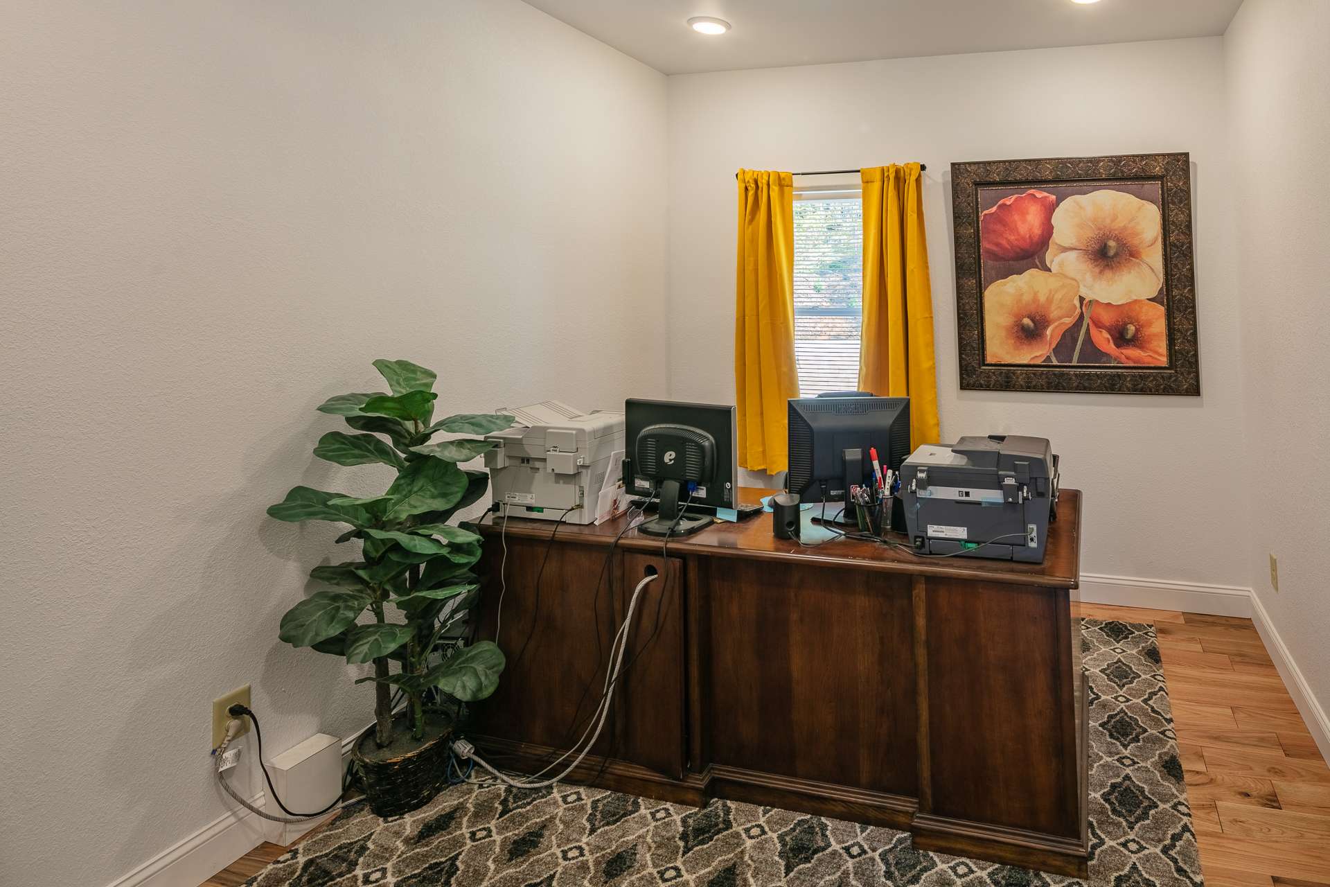 A spacous home office and laundry room complete the main level.