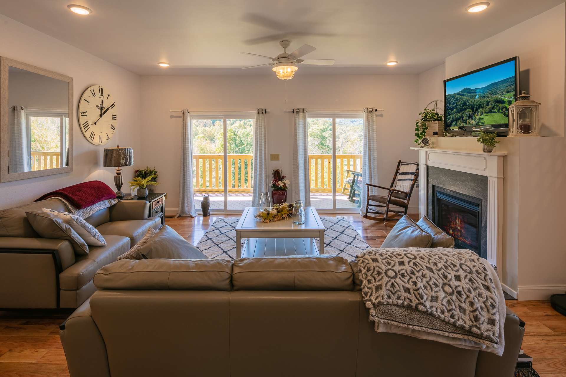The living area features gorgeous gleaming 5" oak flooring and a Buck Stove gas fireplace.