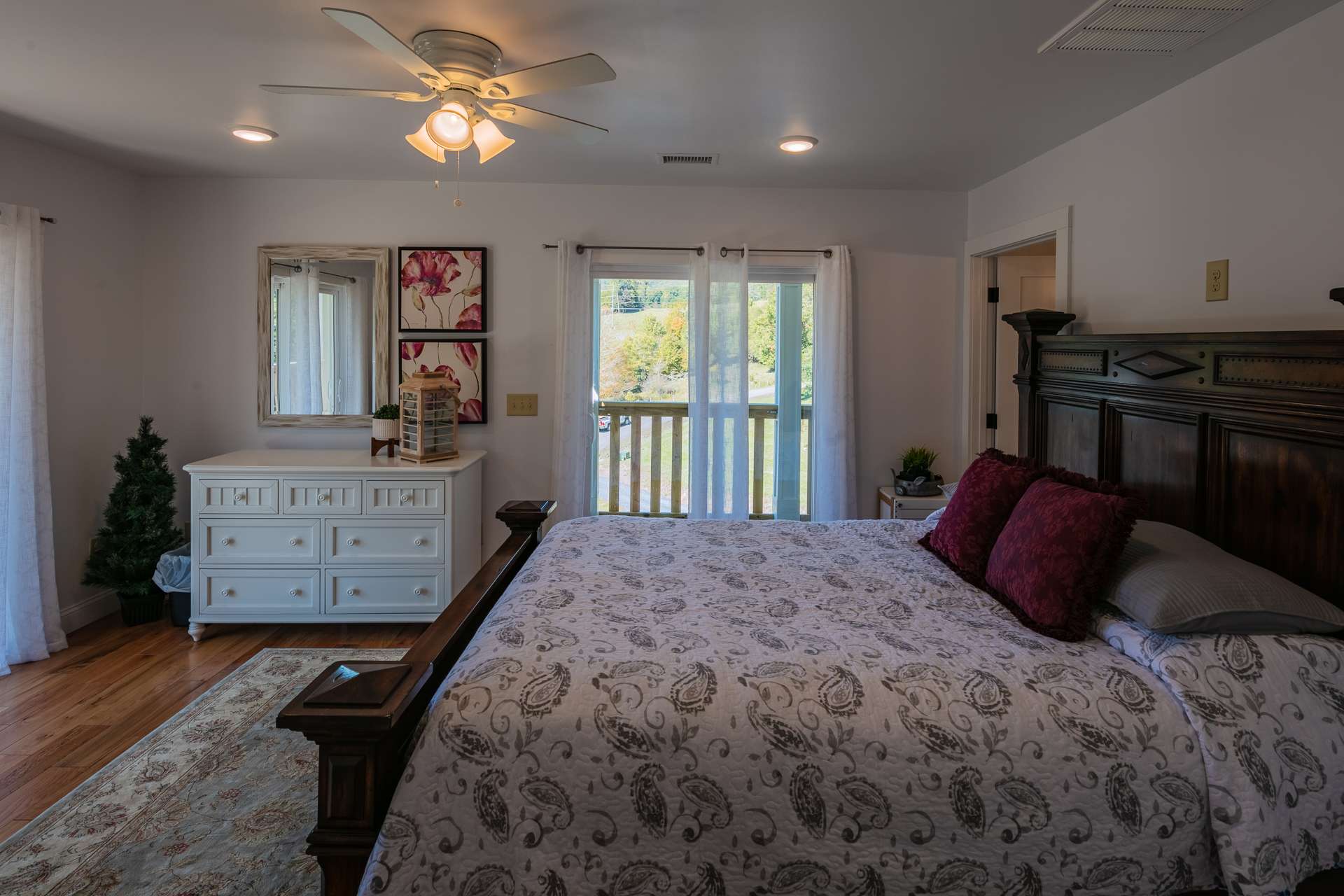 The upper level features two guest bedrooms, each with their own walk-in closet,  private bath and deck.