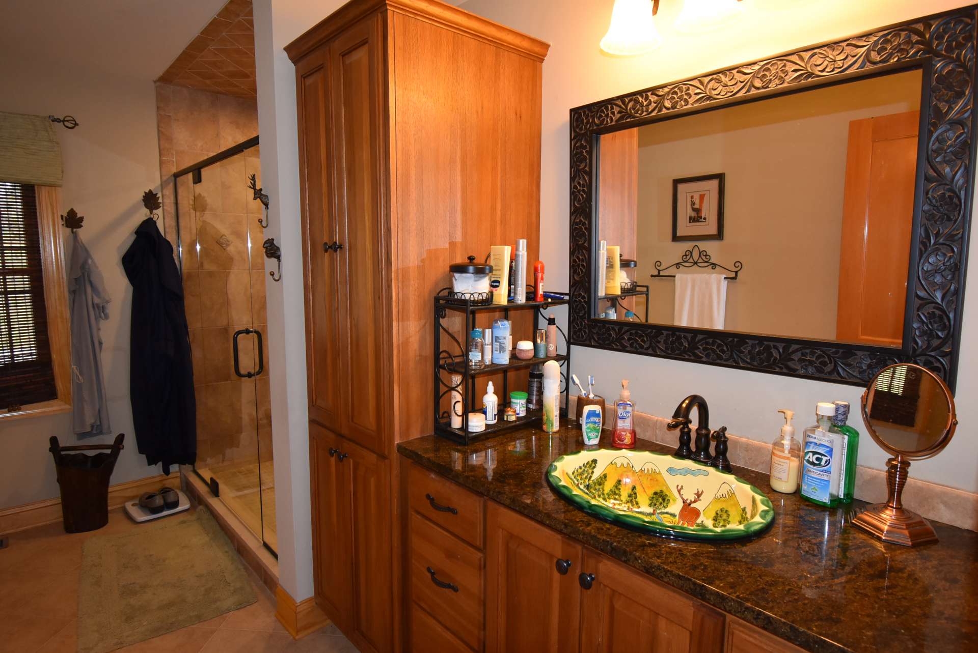 You will appreciate the many craftsman details such as the sink here in the master bath, and the walk-in tiled shower.