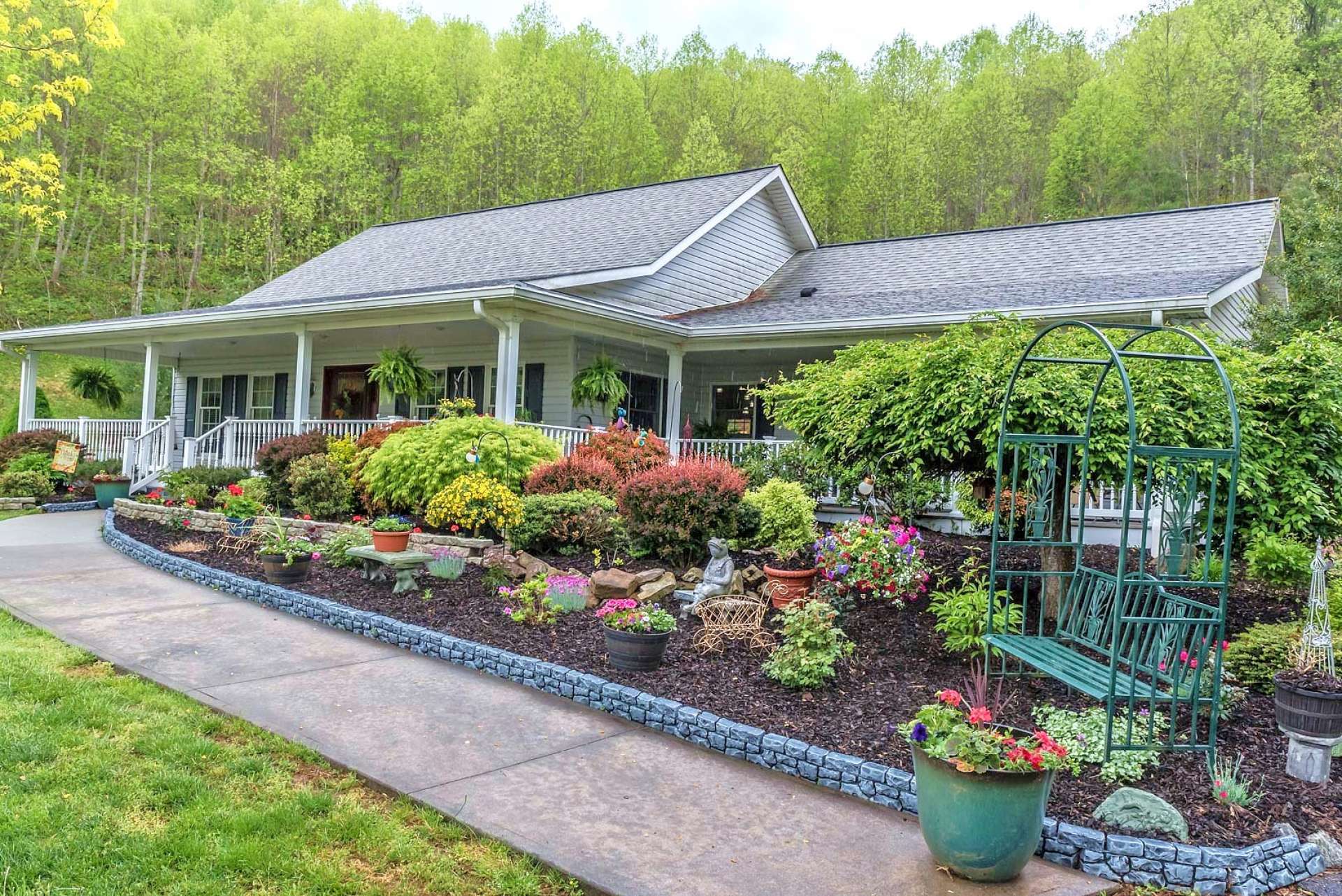Lovingly landscaped, this 3-bedroom, 3.5 bath home welcomes you home and invites you to enjoy country living at its finest.
