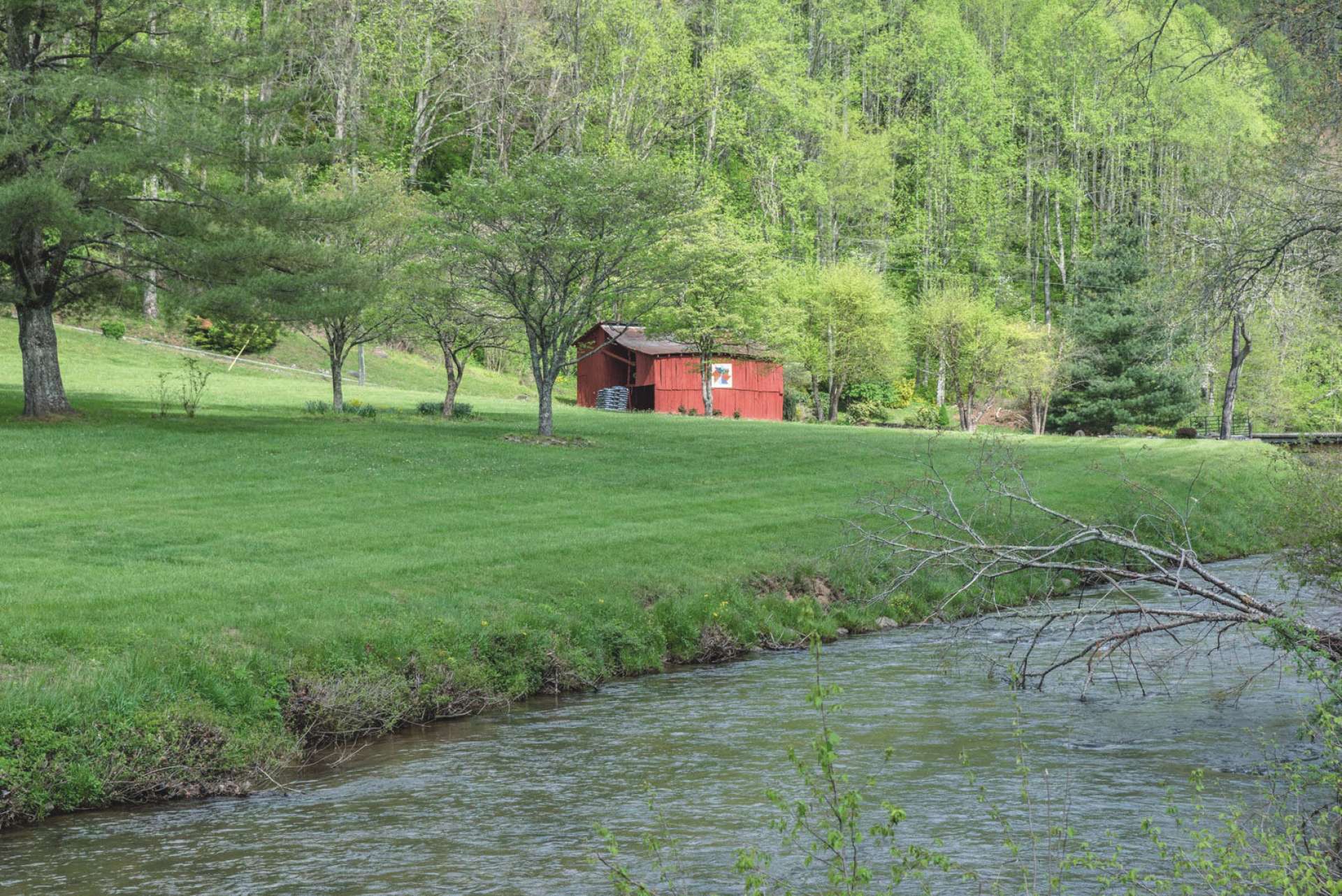 Even a barn for livestock or equipment storage.  And then there is the creek! Owner says you can launch your kayak or tubes and float to the New River near by.