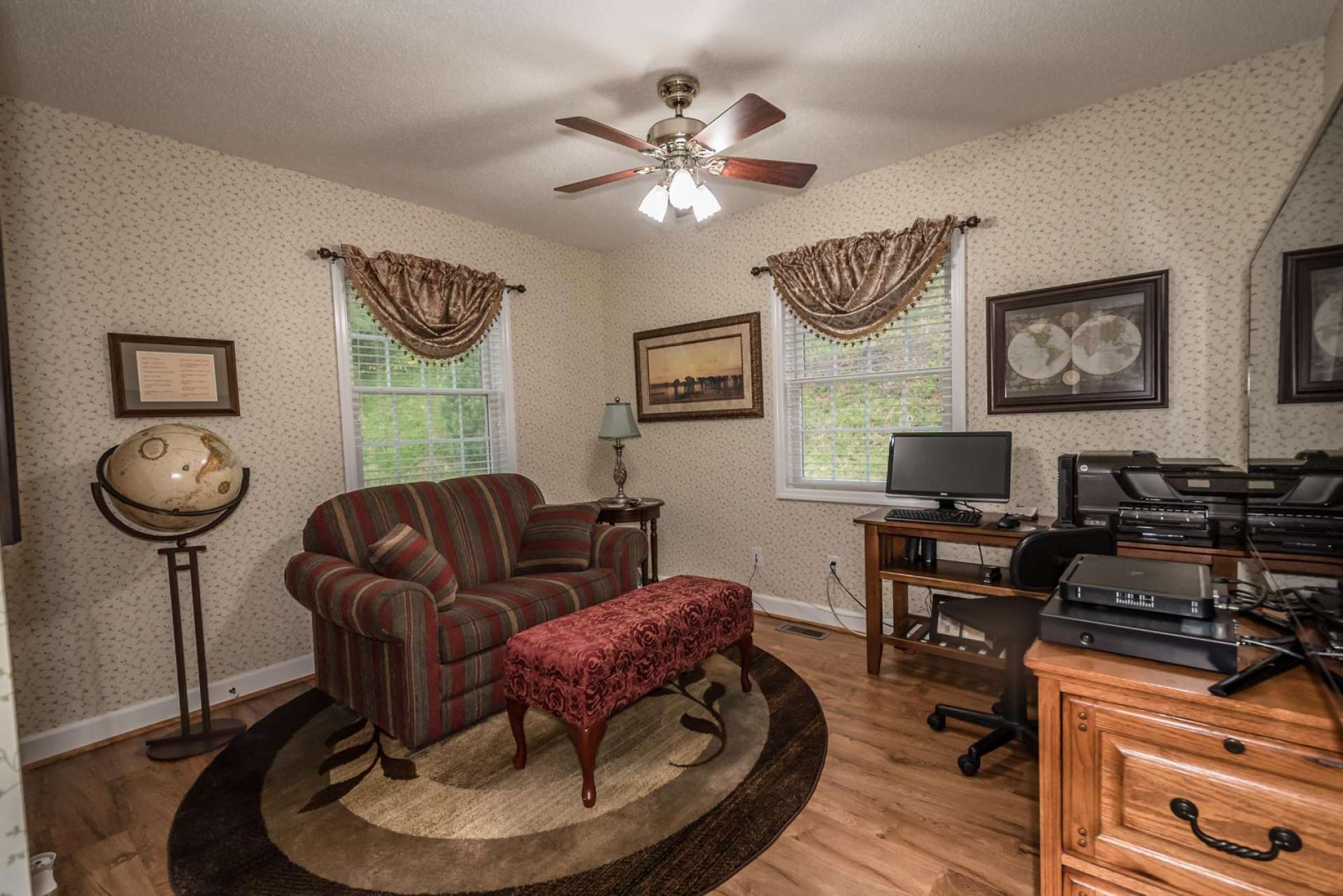 Also, located on the main level, is this amply sized room is currently utilized as a home office. A laundry room and half bath complete the main level.