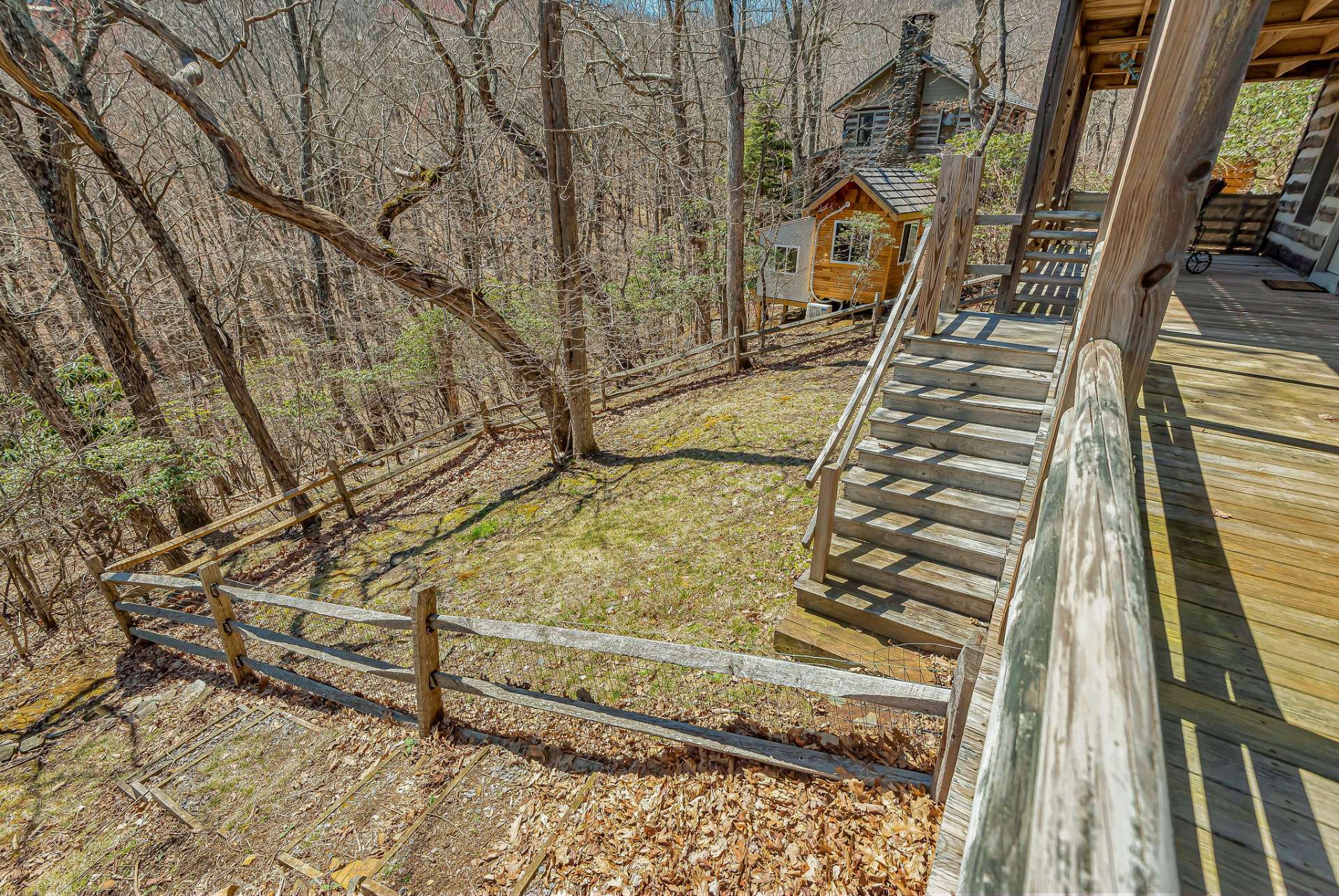 This enclosed area is an added feature for dog owners. Your furry companions can easily access the grass when you open any of the back doors. They have a secure path to the fenced in area.