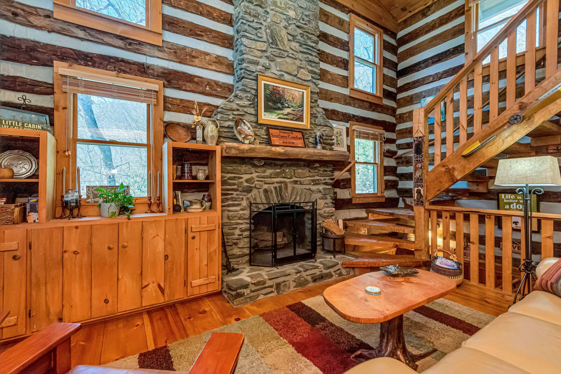 The nostalgic aroma and comforting crackling sound of a wood fire evoke a truly authentic log cabin experience.