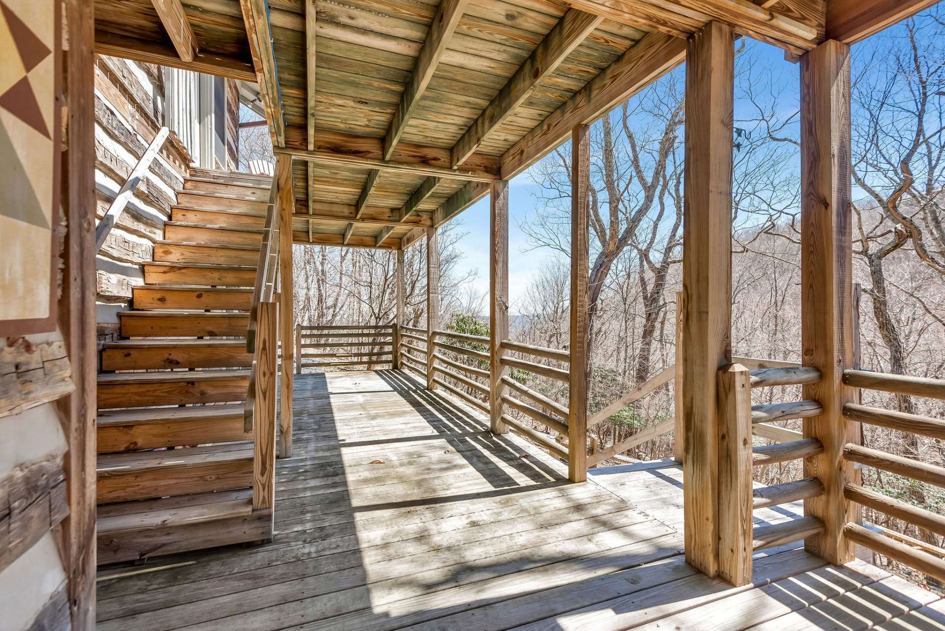 This staircase leads you back up to the main level deck and it's outdoor living area.