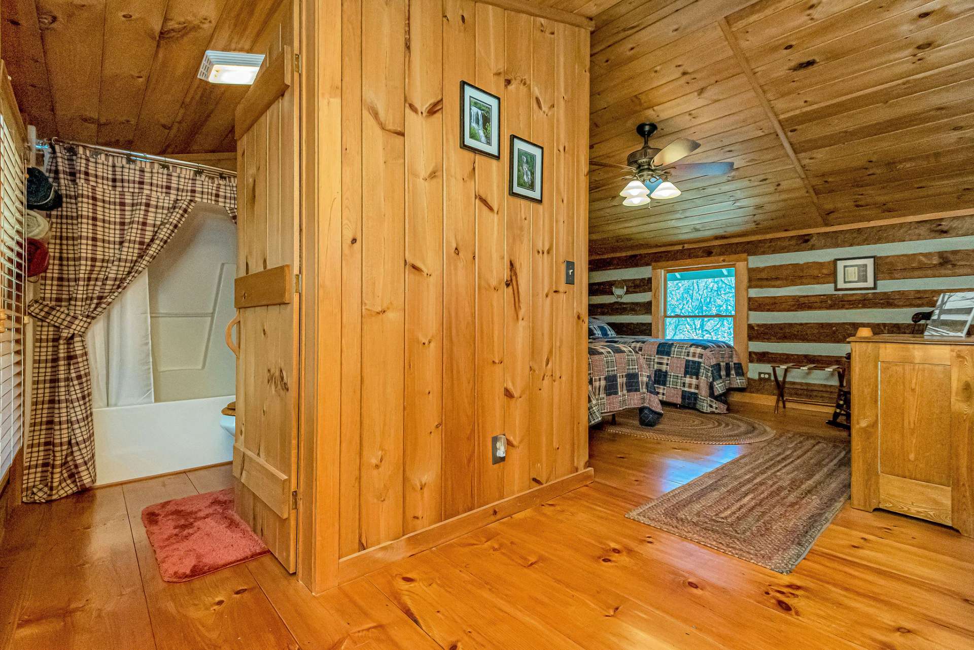 The loft's guest bedroom is complete with a full bath.