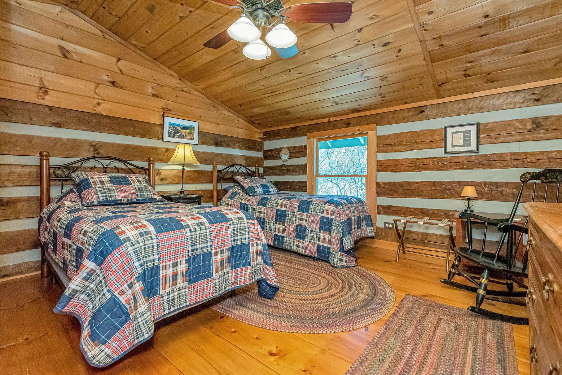 The vaulted ceiling and windows make this a cheerful place to stretch out and unwind after a day of sight seeing the High Country.