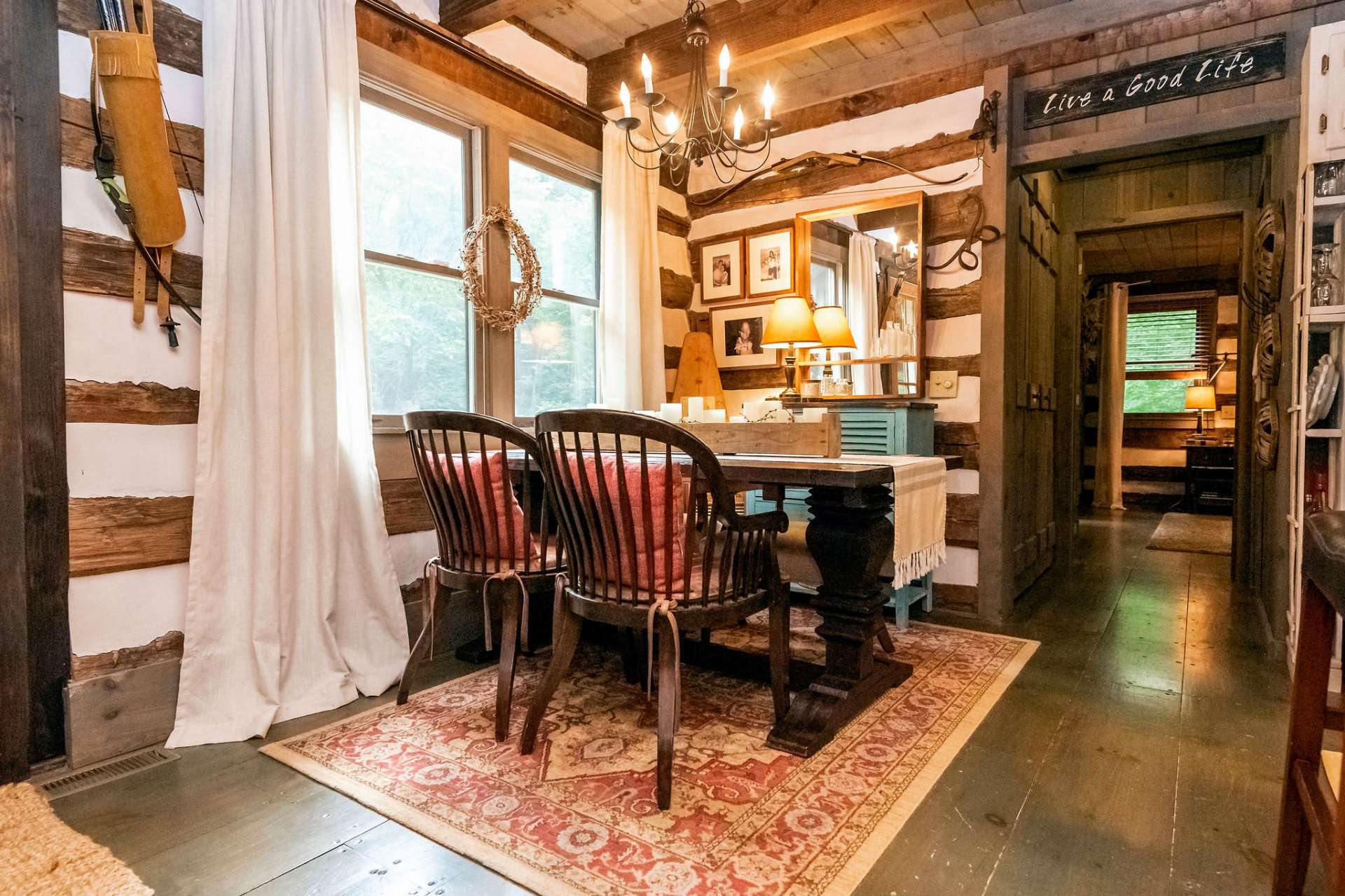 This charming dining area overlooks the naturally landscaped front lawn.