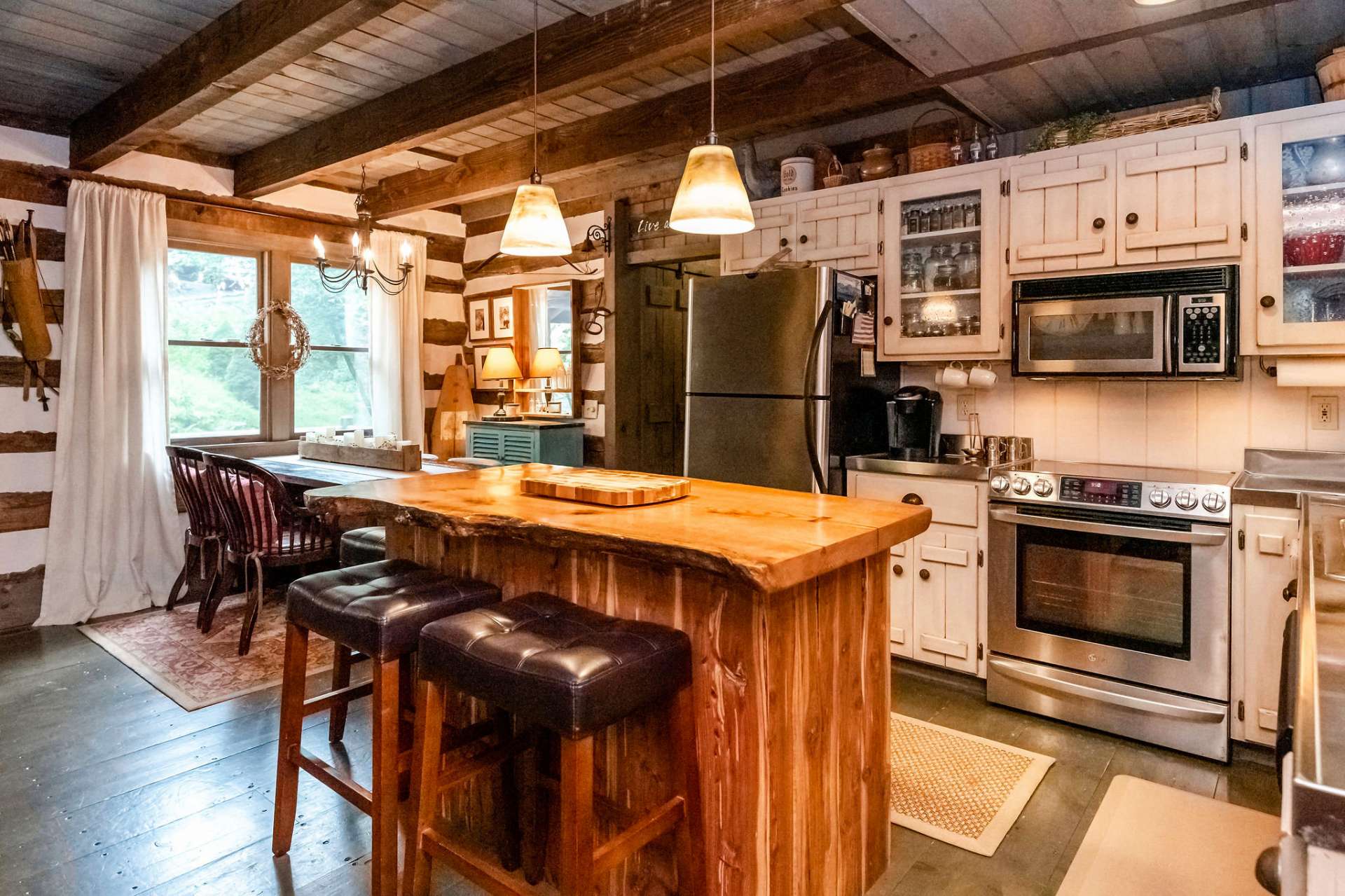 Your guests will admire the unique kitchen island with bar seating.