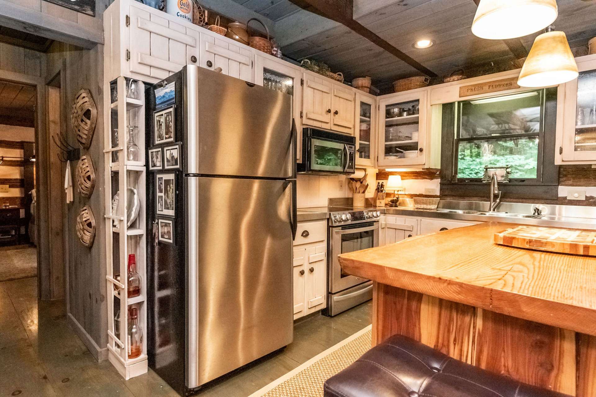 This kitchen intertwines modern with rustic in a fabulously creative way.