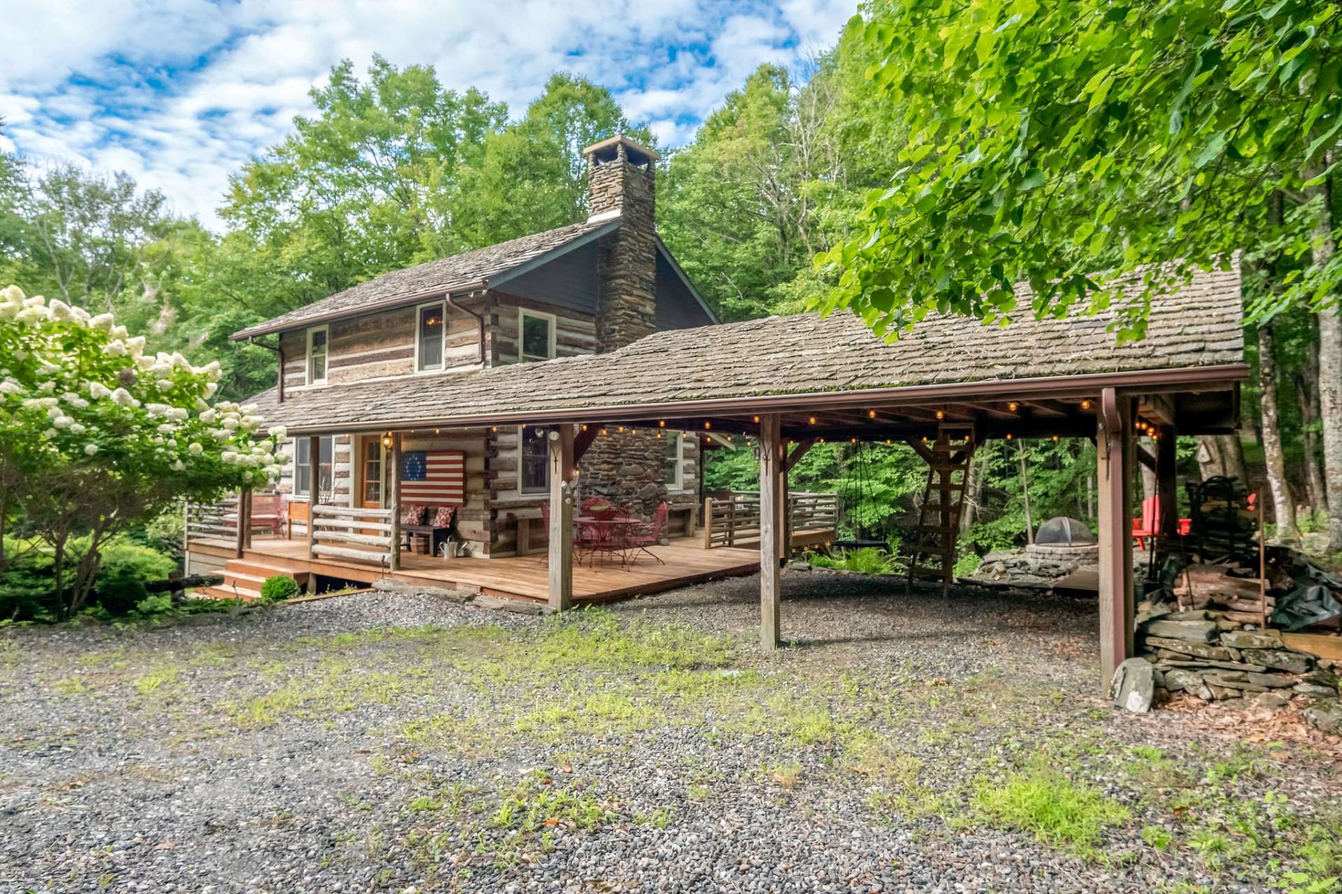 This multifaceted carport can accommodate parking for two vehicles or add outdoor space for your Creekside entertaining.