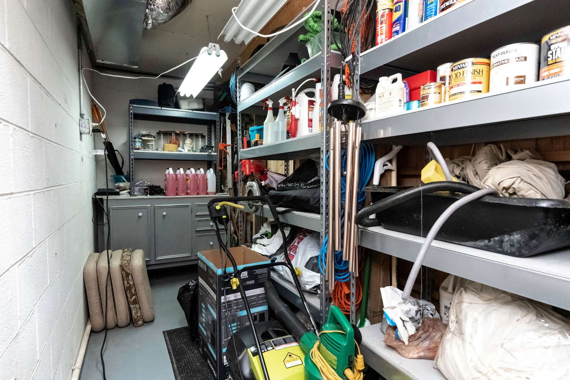 Behind the double barn doors of the den is additional storage.