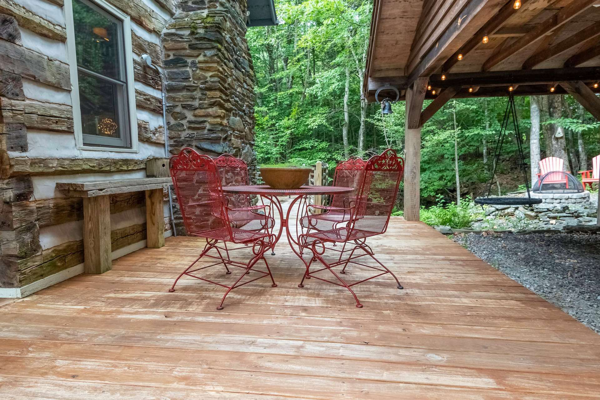 Wrap around deck offers many areas to enjoy outdoor living and is spacious enough for neighborhood gatherings.