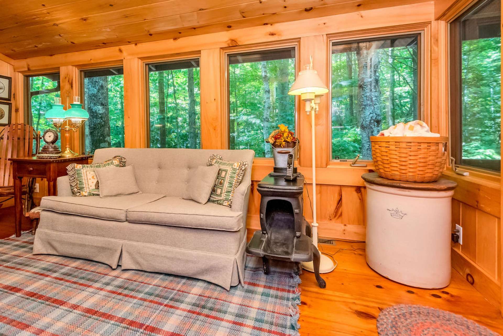 The den with creek views offers the music of nature when the windows are open.