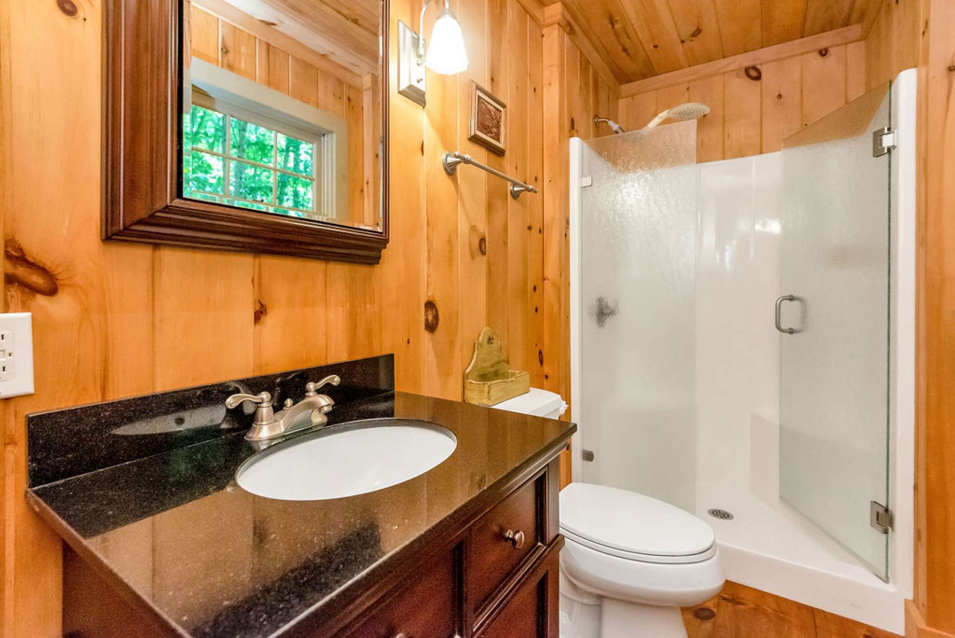This main-level guest bath is just off the den.