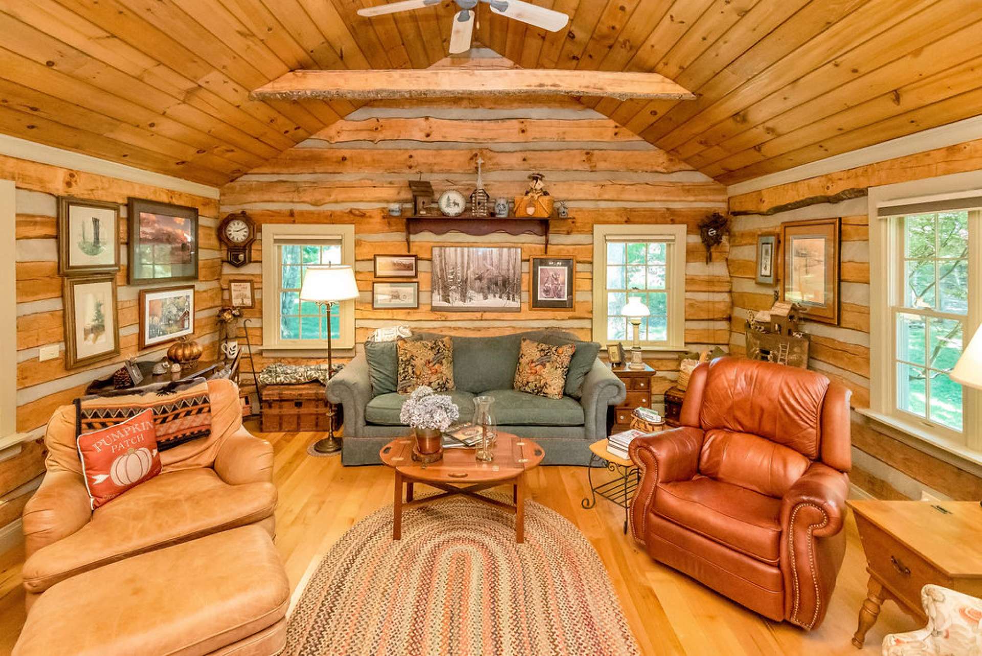 Natural light abounds in this room with vaulted ceilings and windows all around.