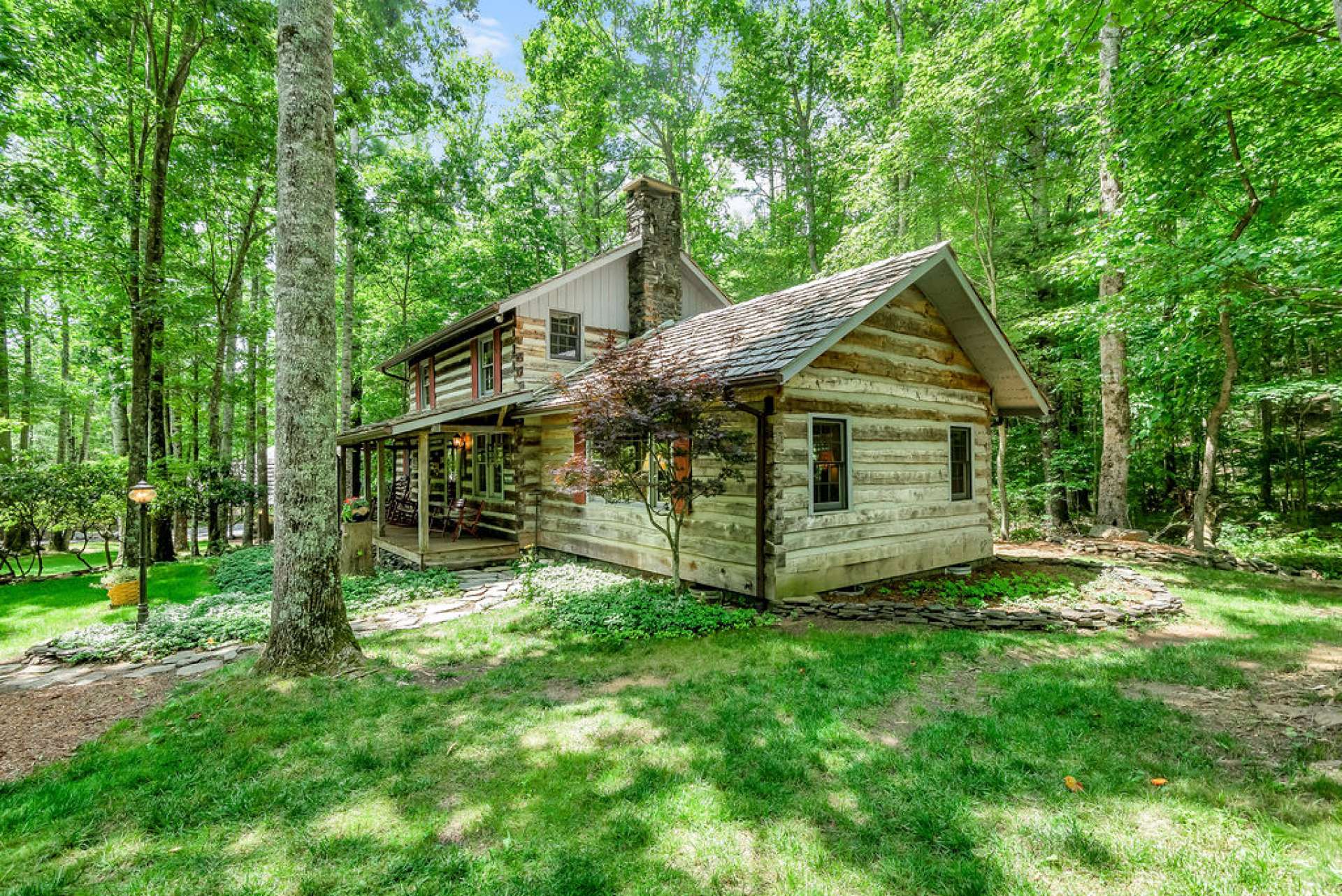 A storybook cabin in a fairytale setting.