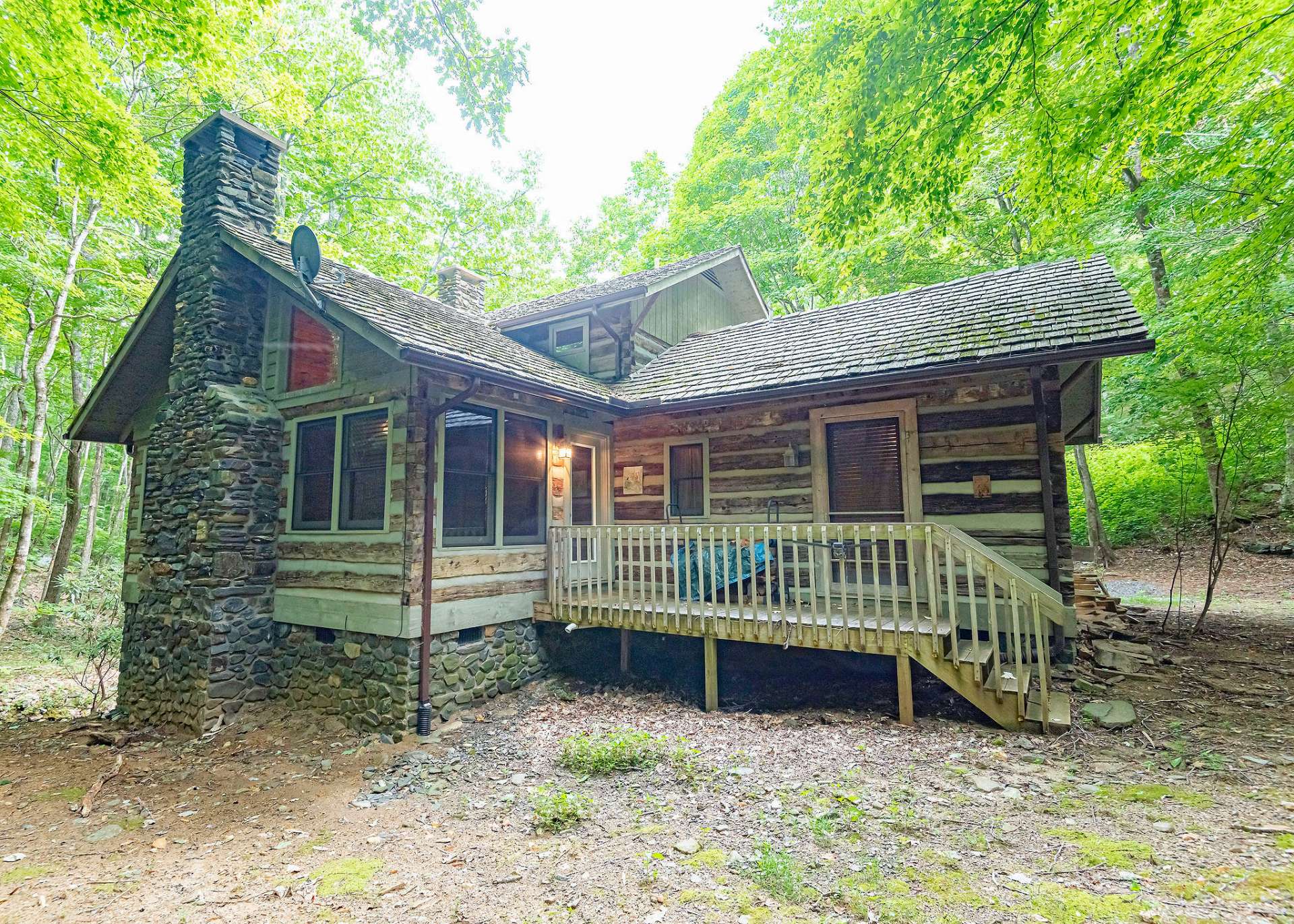 There is also, an open deck area in the back to enjoy the wooded setting and the creek.