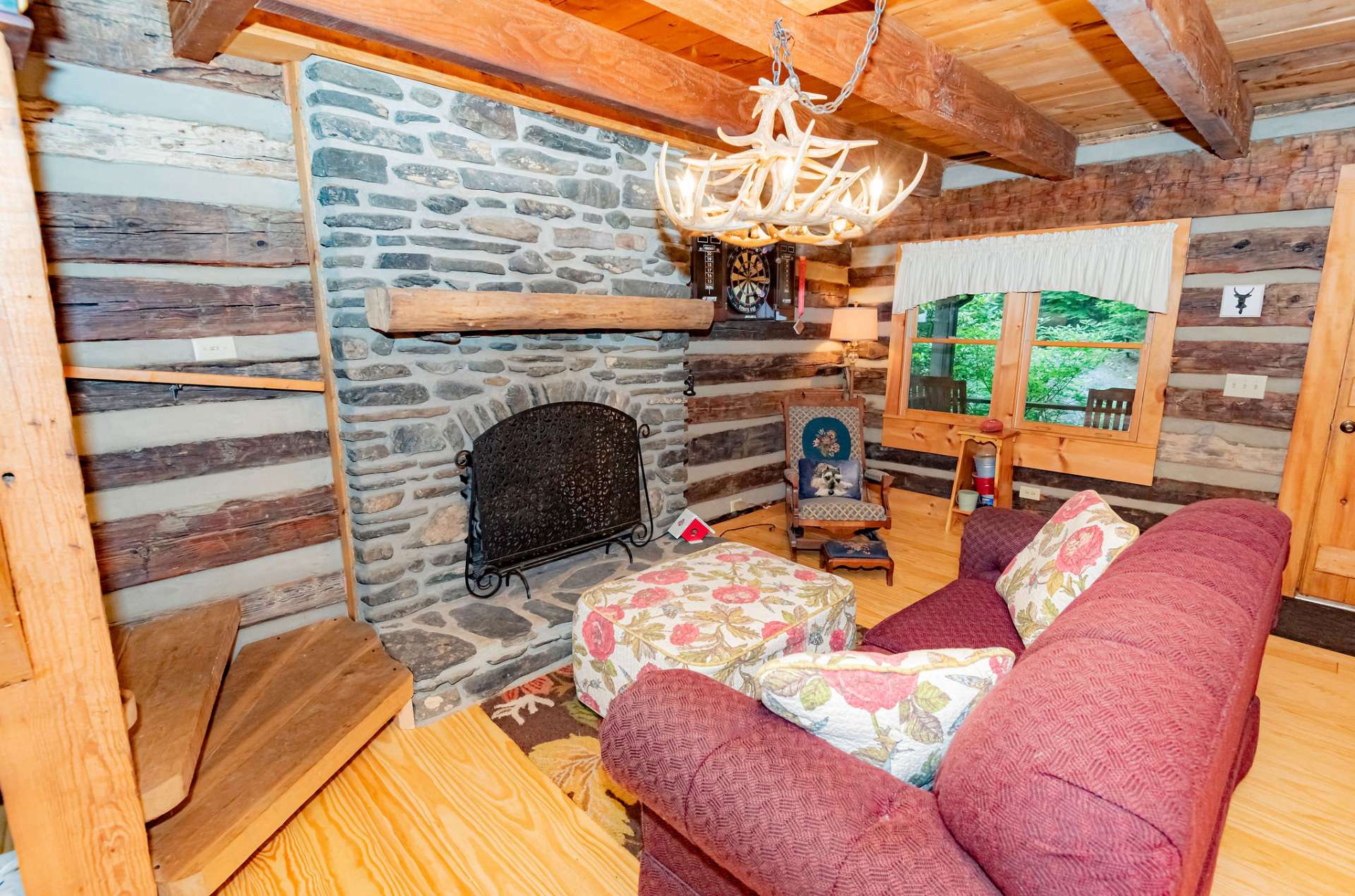 A stone fireplace is the focal point of the great room.