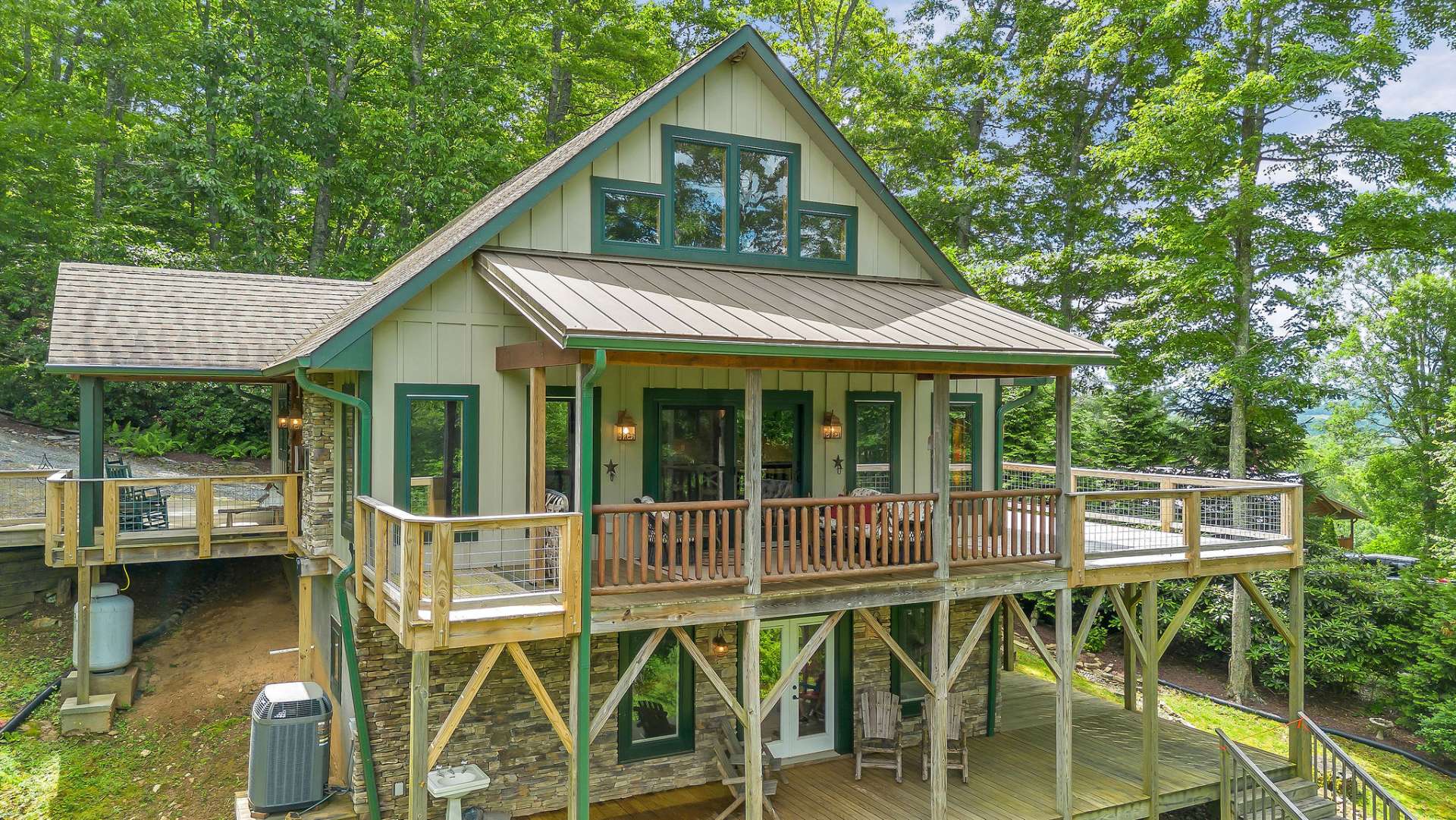 Enjoy abundant mountain views from the large covered and open decks.