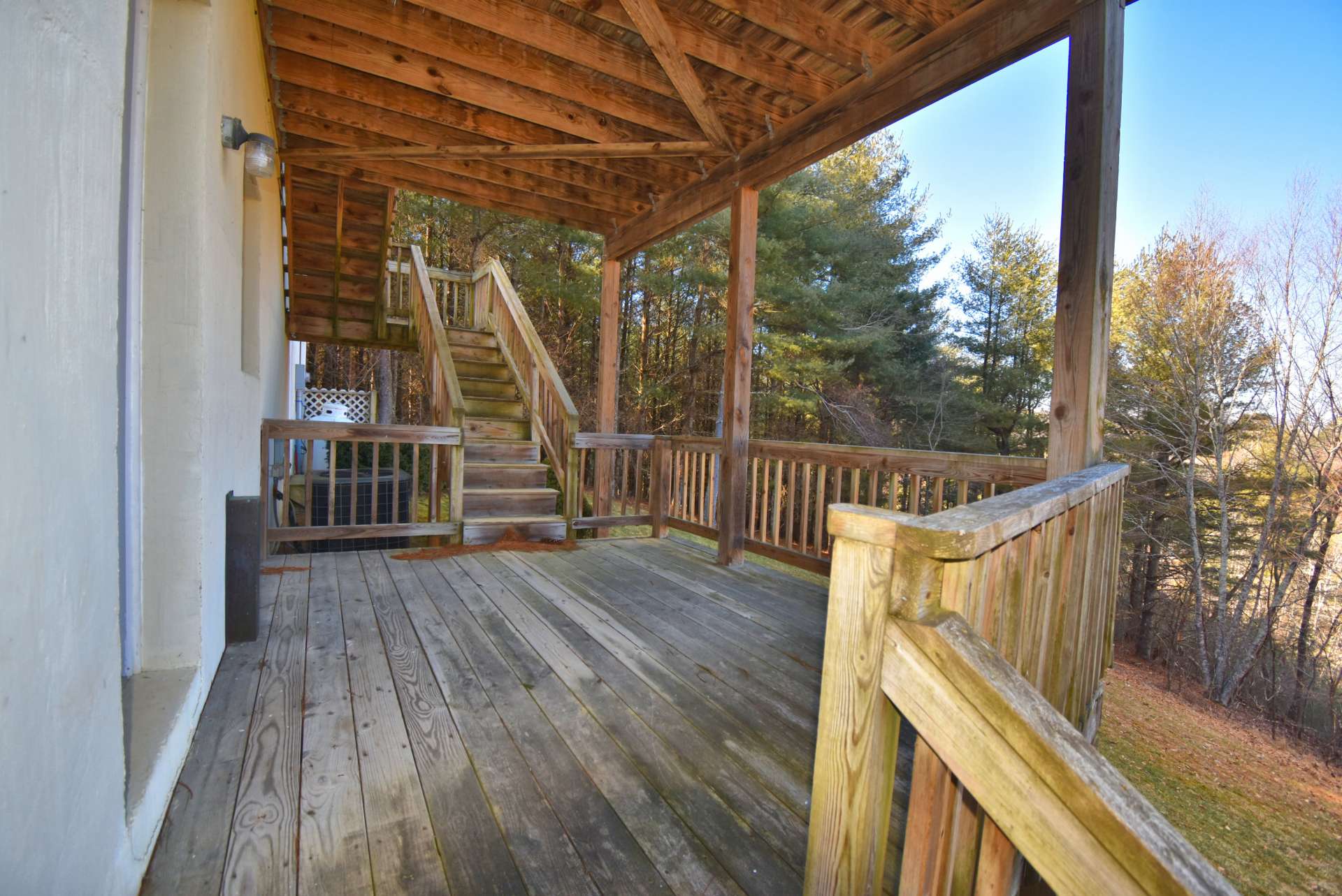 The lower level also offers access to the lower covered deck where you will enjoy the mountain views as well as views of the neighboring community pond.