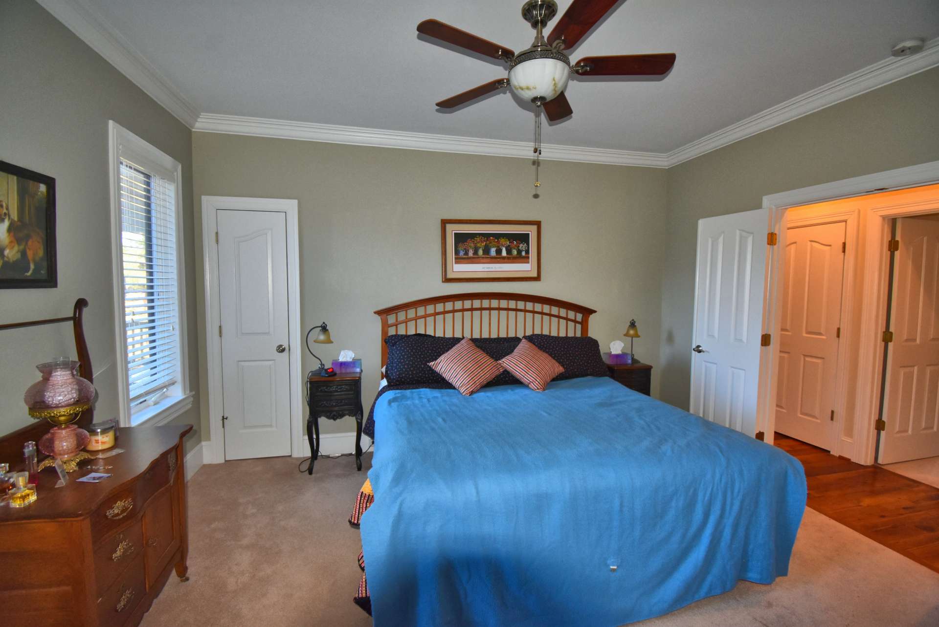 The master bedroom suite features "His and Hers" closets. Designer paints are used throughout the home with scores of large windows to bring the views inside the home.