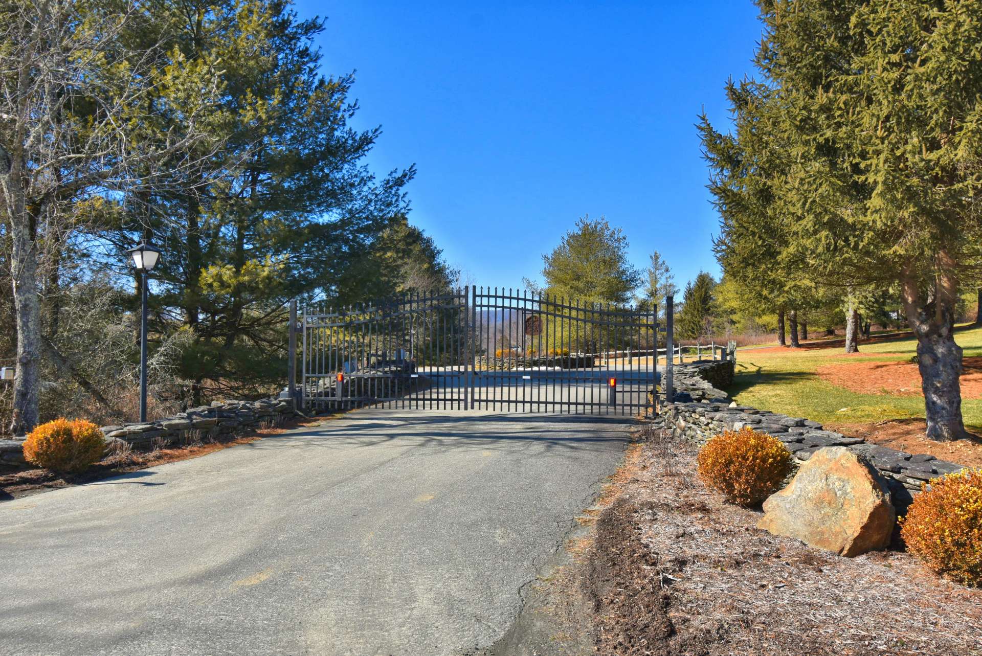 A beautiful stacked stone entrance sets the tone as one drives into the Village, a gated community with paved roads, underground utilities, a riverfront park and dedicated walking trails open to all that call the Village home.