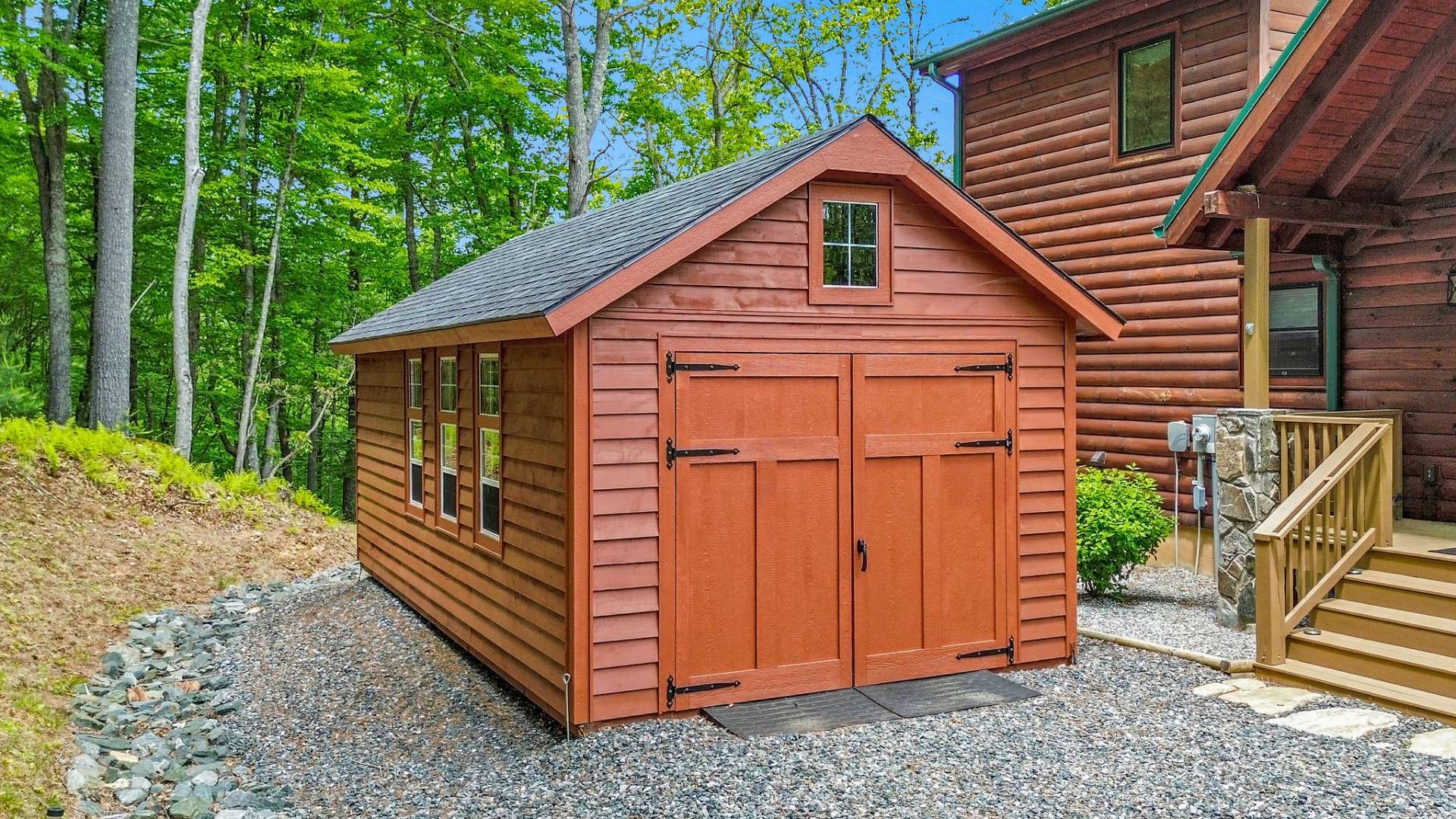 This sweet detached building is perfect for storing your mountain toys.