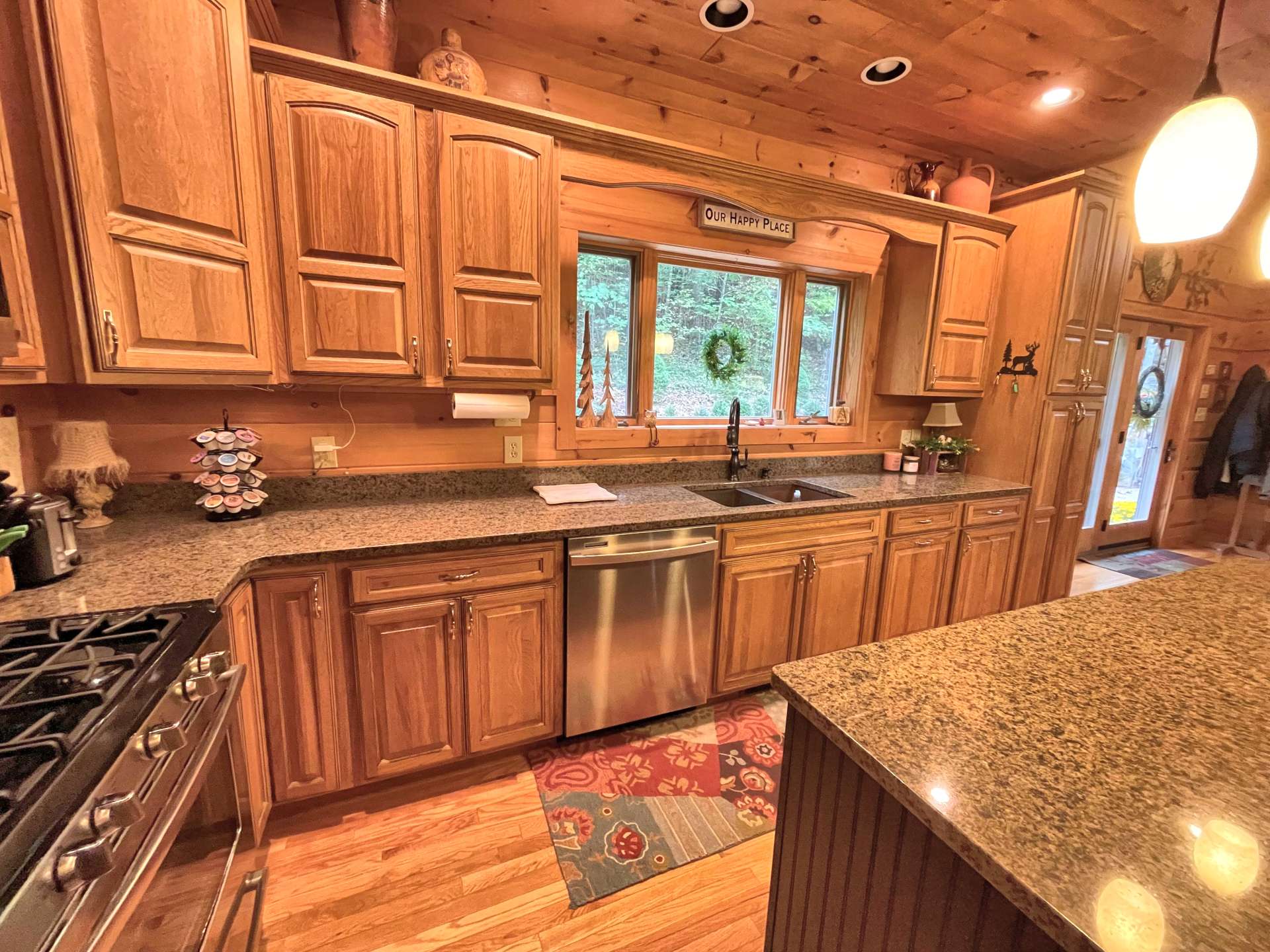 Kitchen area with large window.