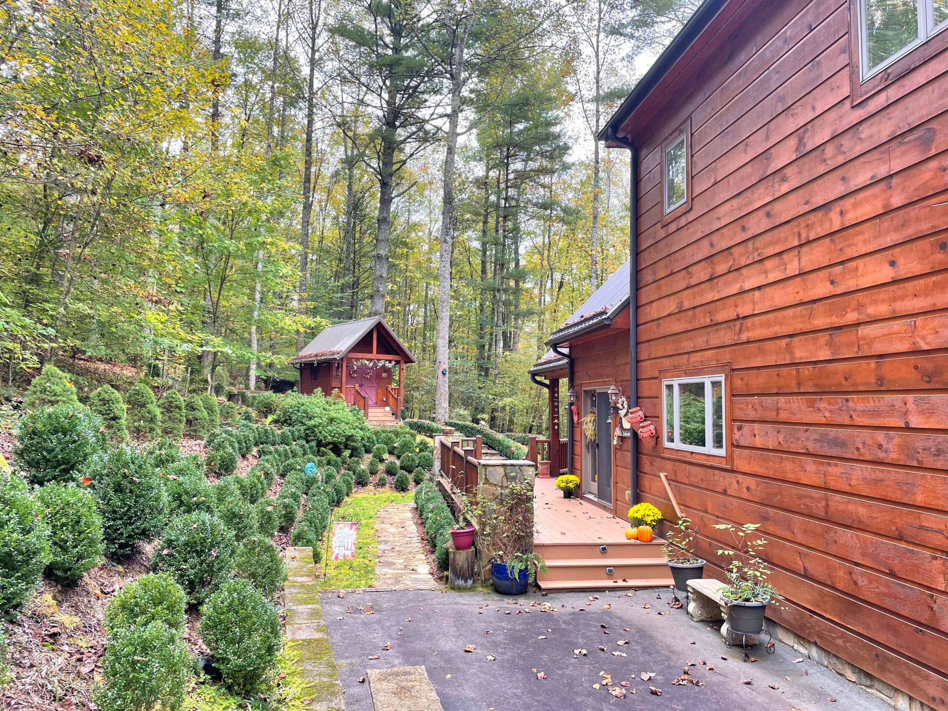 Back of the house with deck and walkway.