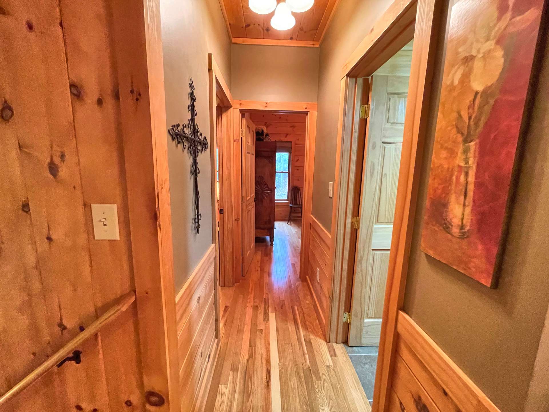 Hallway to guest rooms and bath.