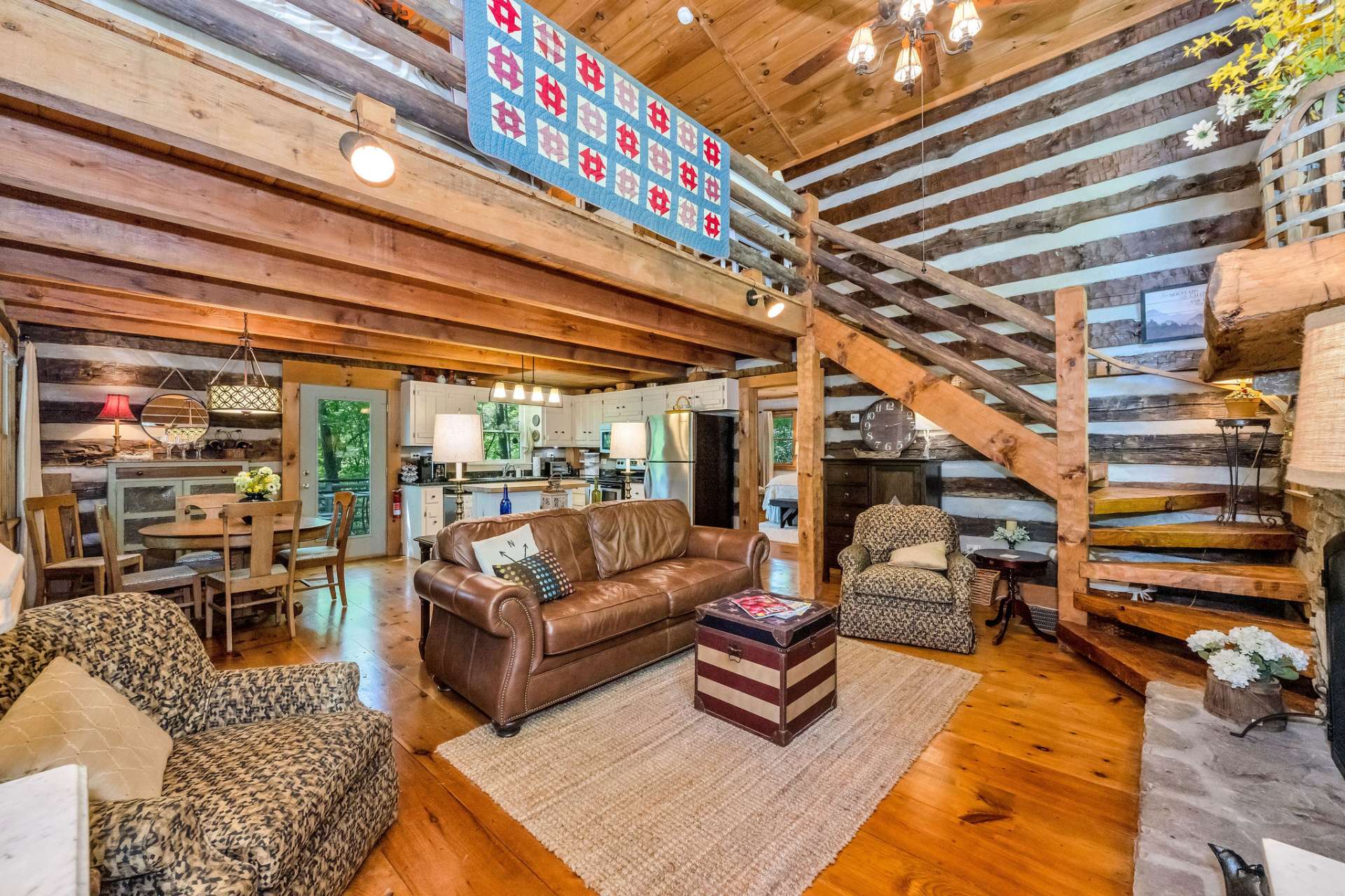 The open floor plan allows for easy transition from the living area to the kitchen and dining areas.