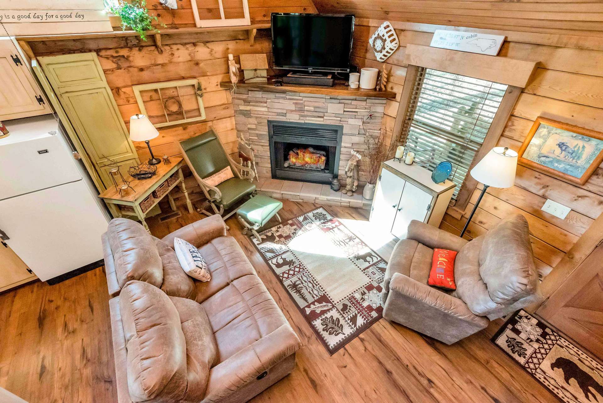 Cozy family room for gathering around the fireplace.