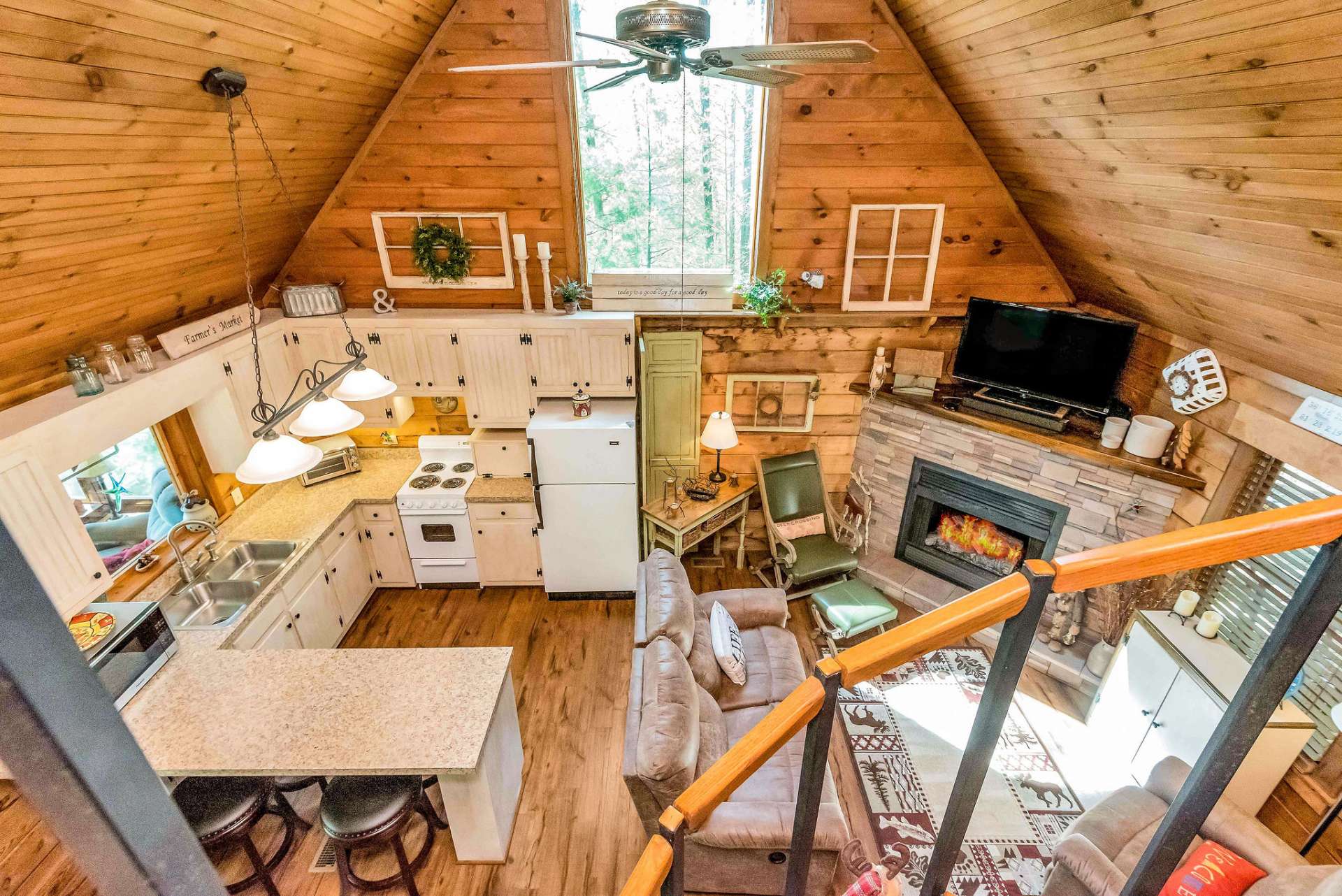 Upstairs looking down at family room and kitchen!