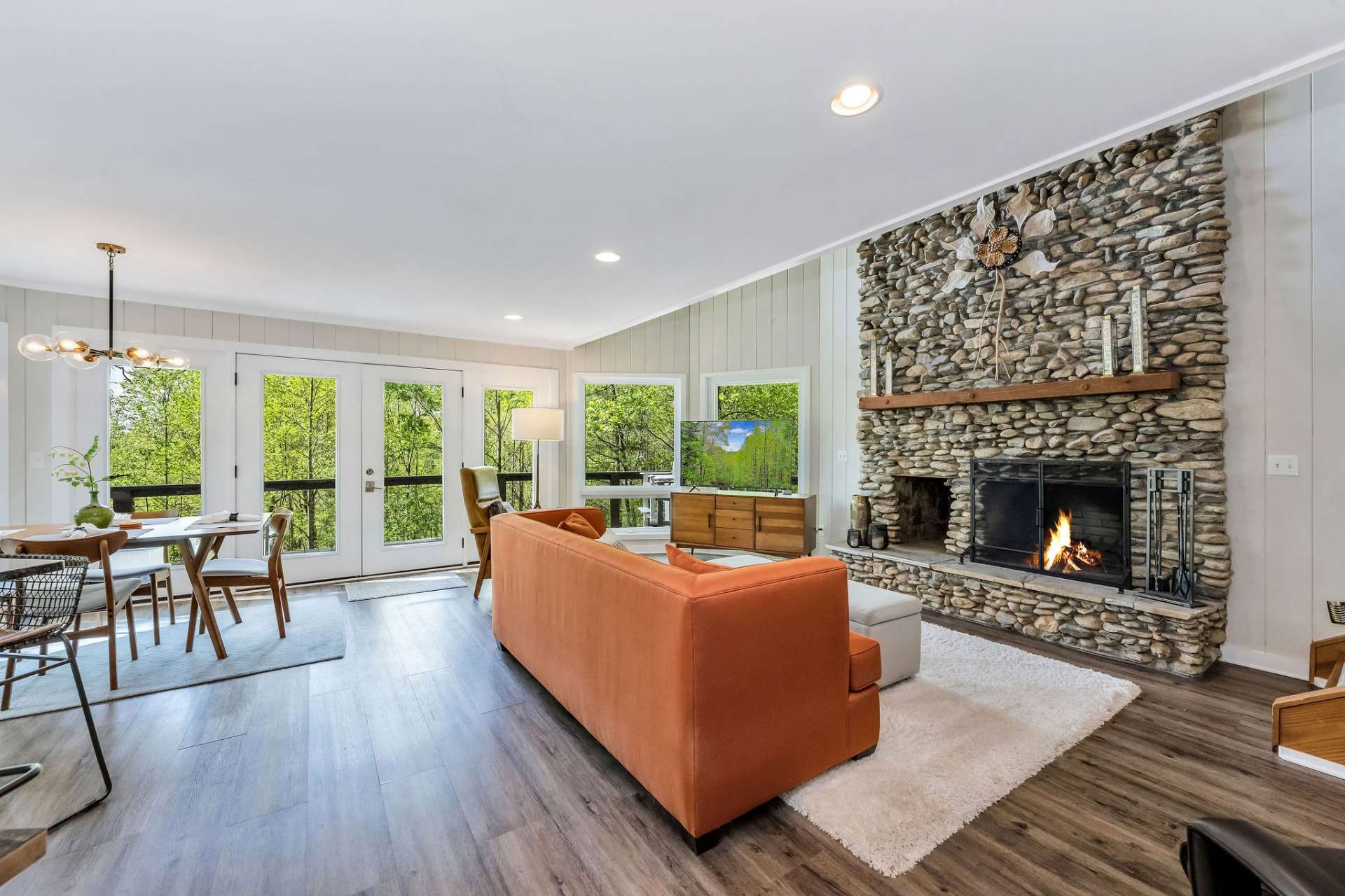 Wall of windows brings in natural light.