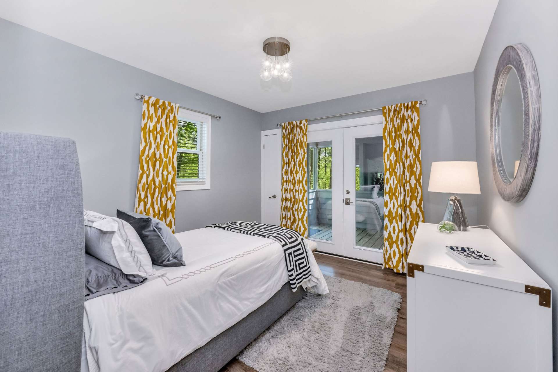 2nd guest bedroom with access to the screened porch.