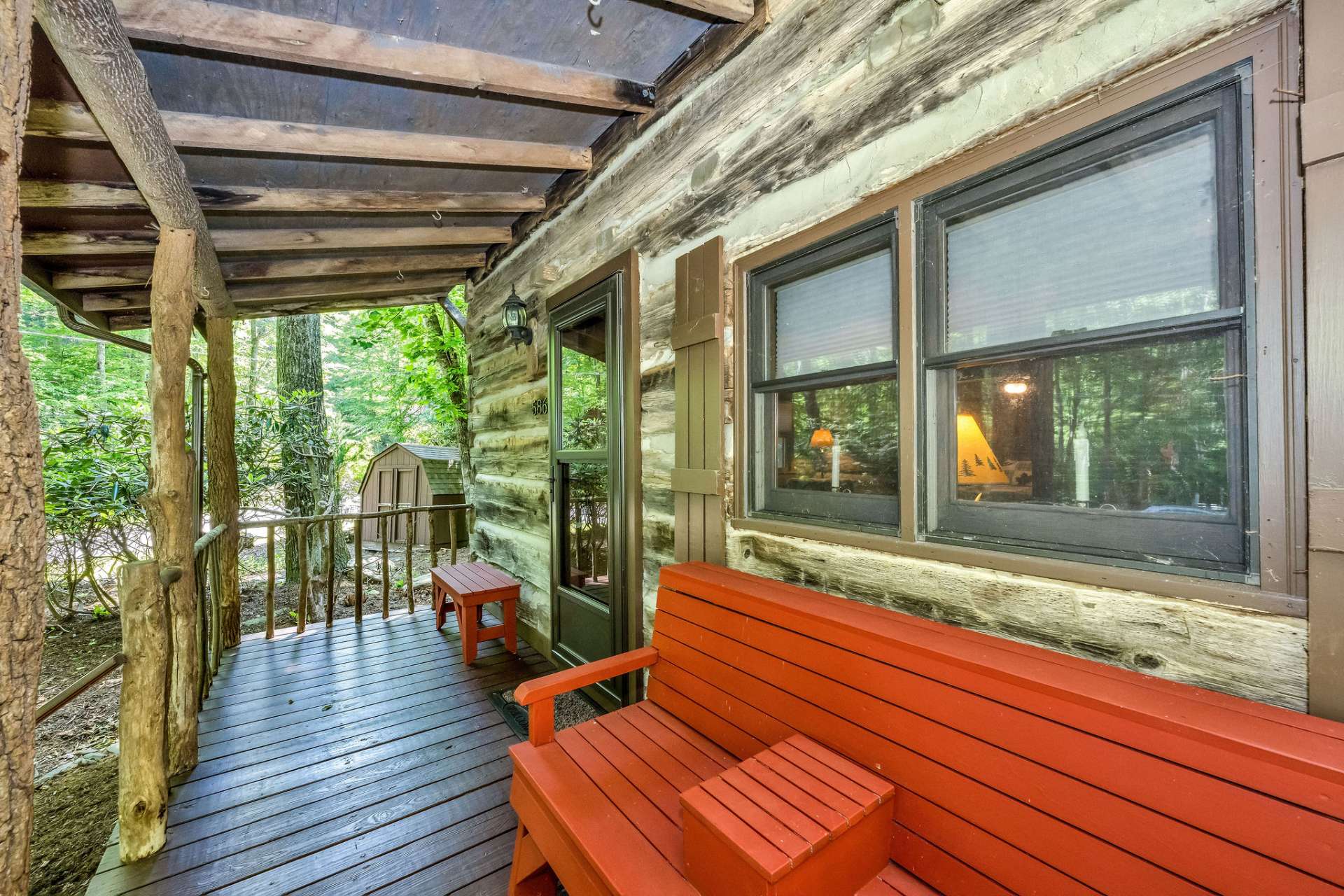 Enjoy the fresh mountain air and the sounds of the creek from the covered Front porch.