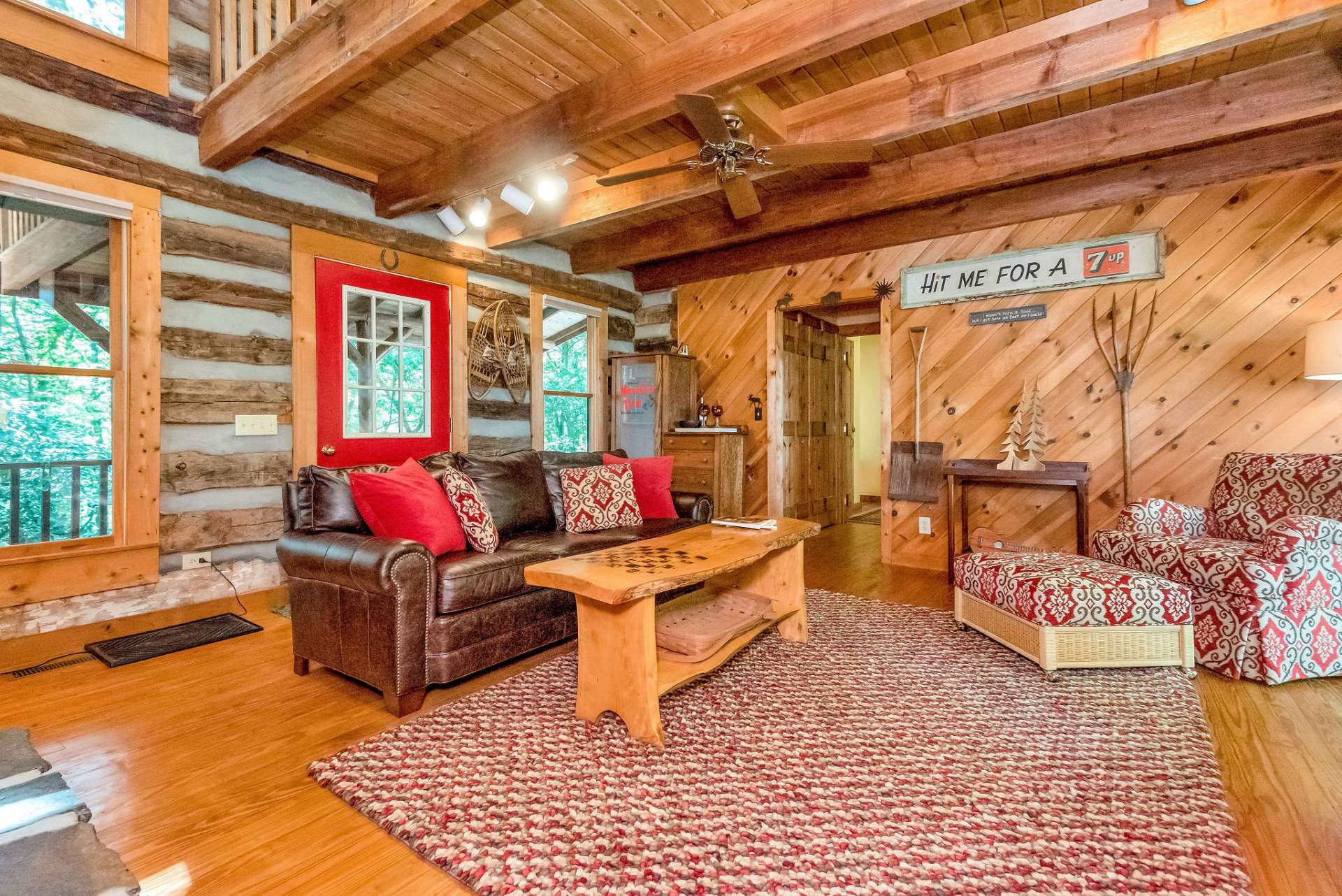 Exposed beams enhance the rustic charm of the cabin.