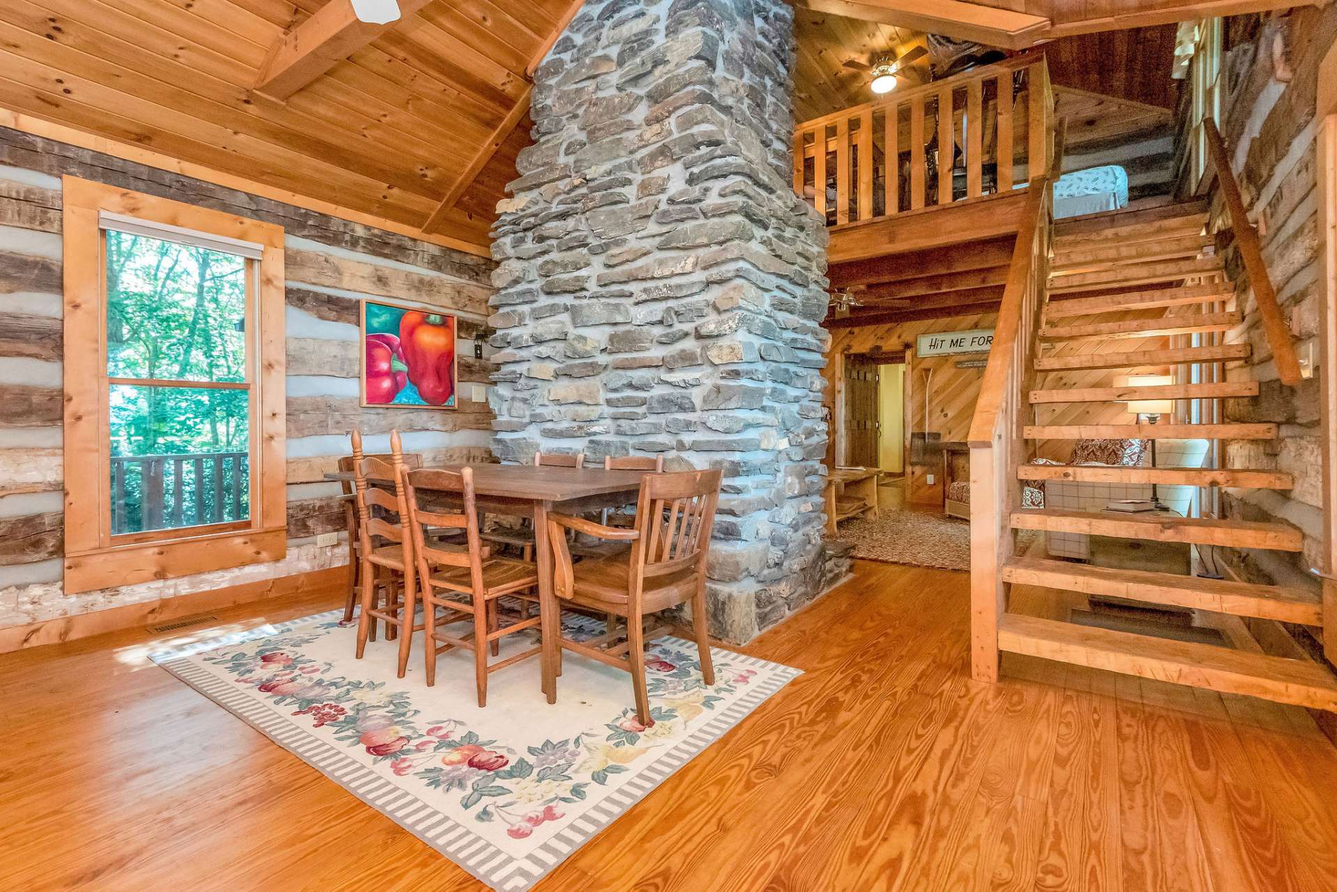 Hand-hewn stairway is a Stonebridge feature, along with a native stone fireplace.