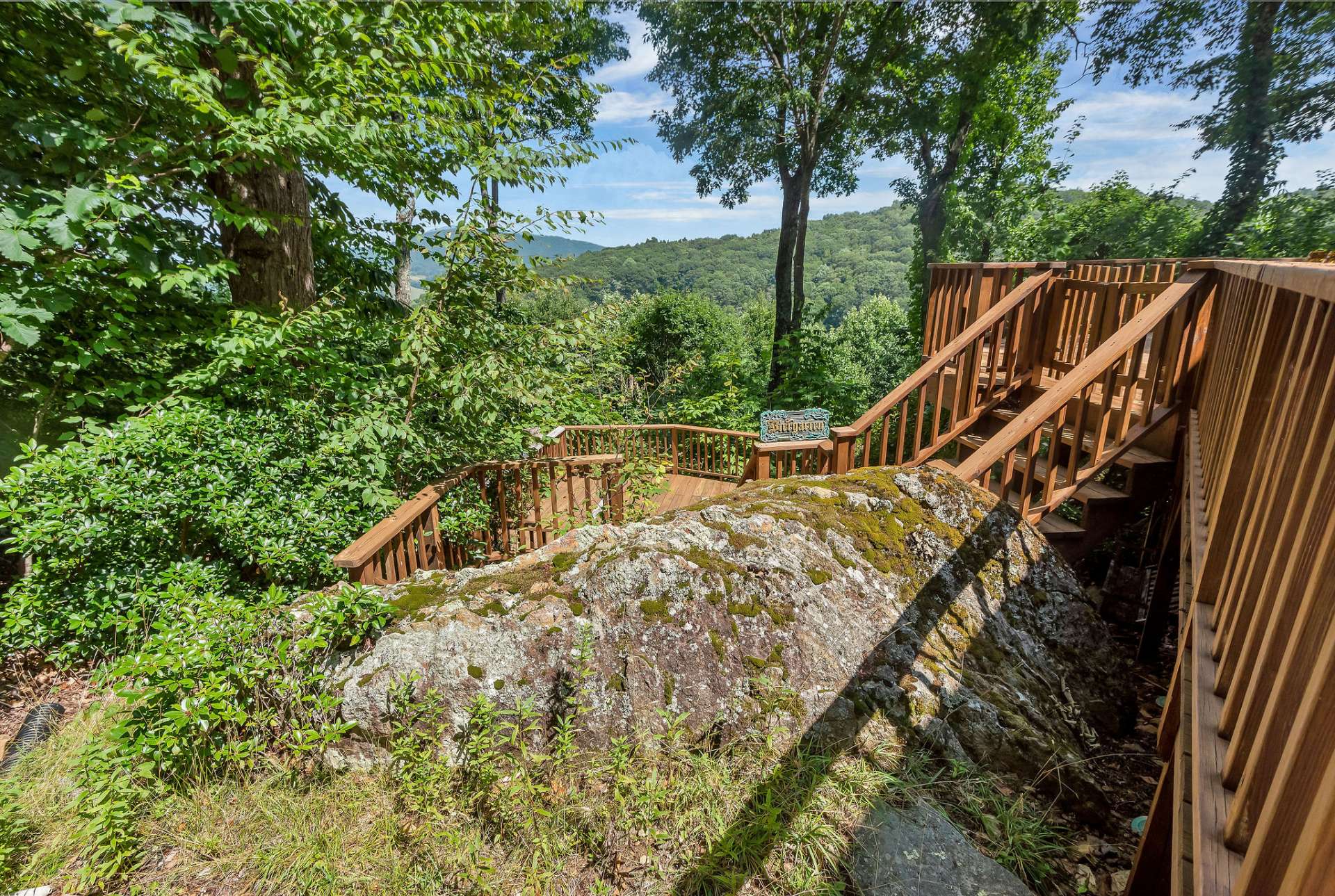 Beautiful rock outcroppings add to the wonder and luster of this mountain home!