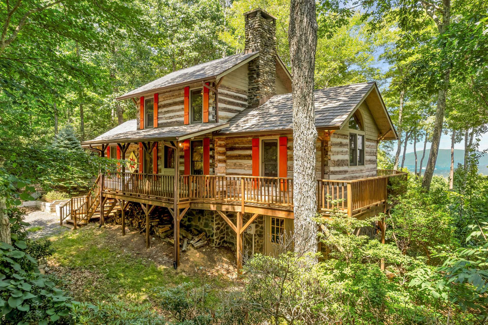 Situated on almost 2 private wooded acres with unique rock outcroppings and....