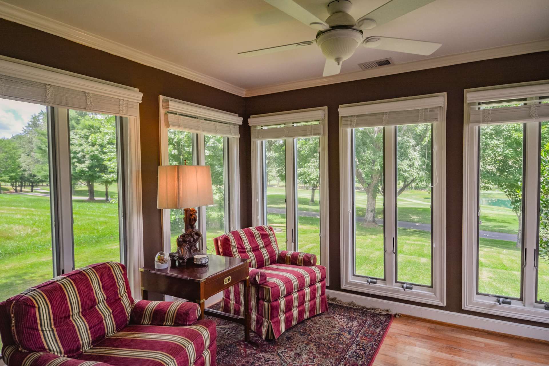 From the sun room, enter onto the open back deck for outdoor dining and entertaining.