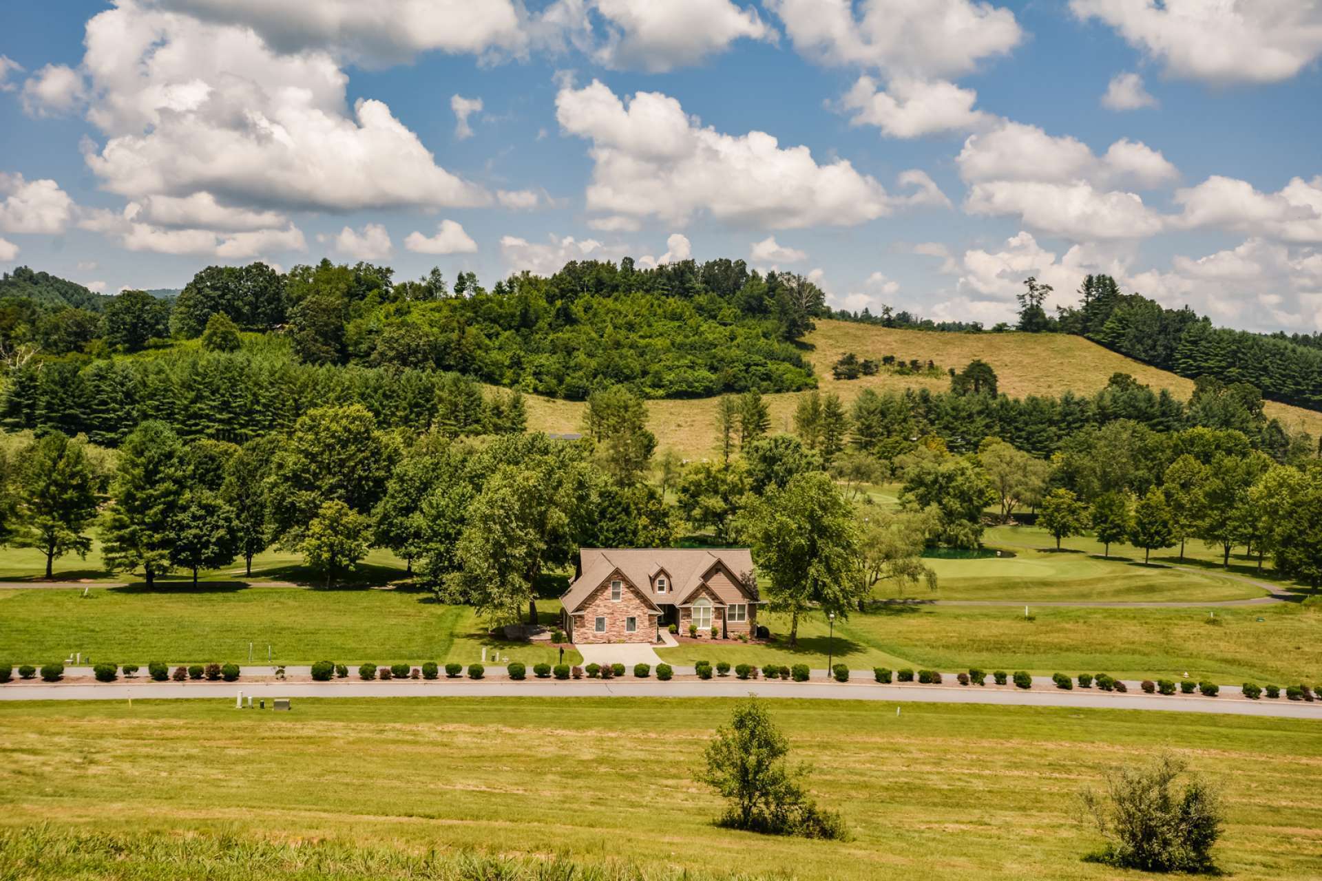 This photo shows the house and setting from afar.